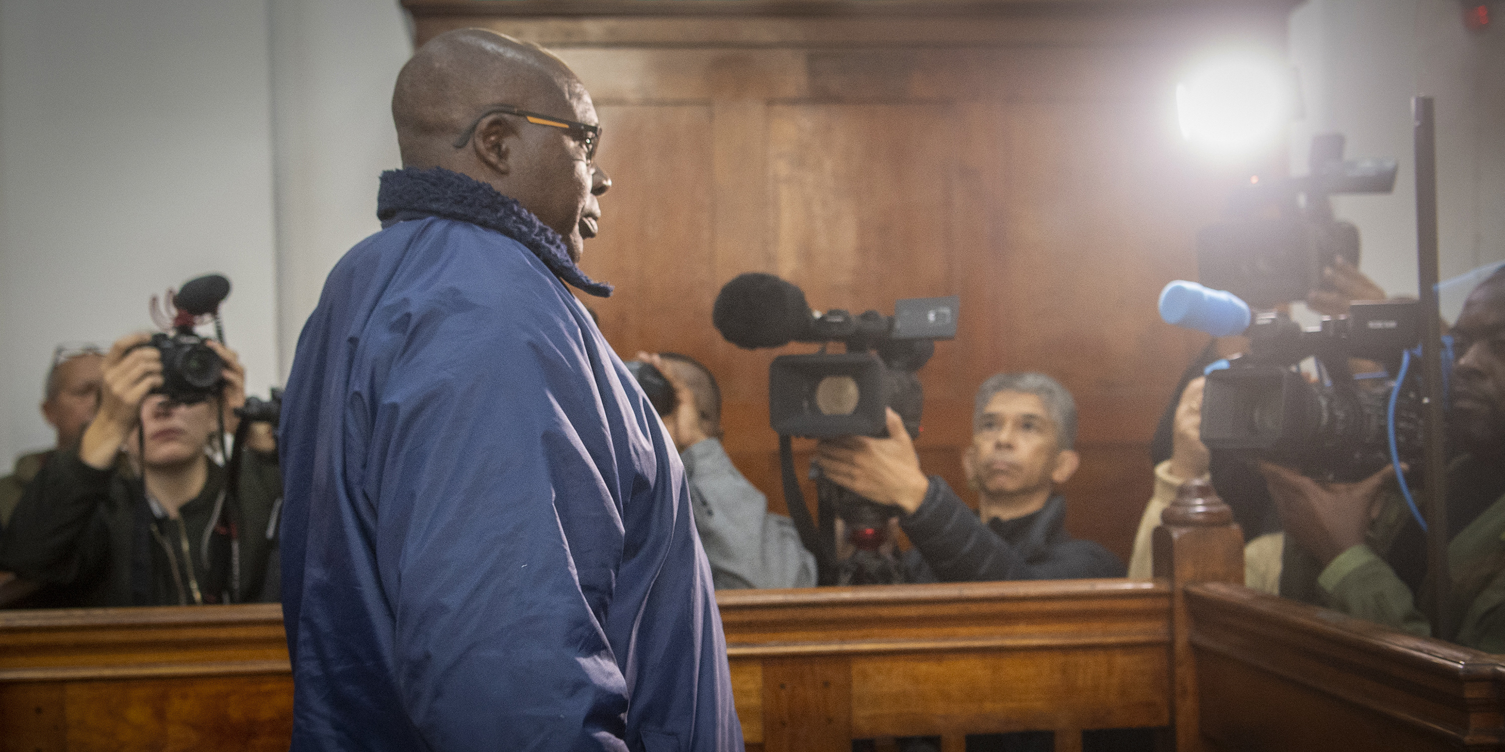 Detained Rwandan genocide suspect slapped with more than 50 charges under SA law ahead of bail hearing 