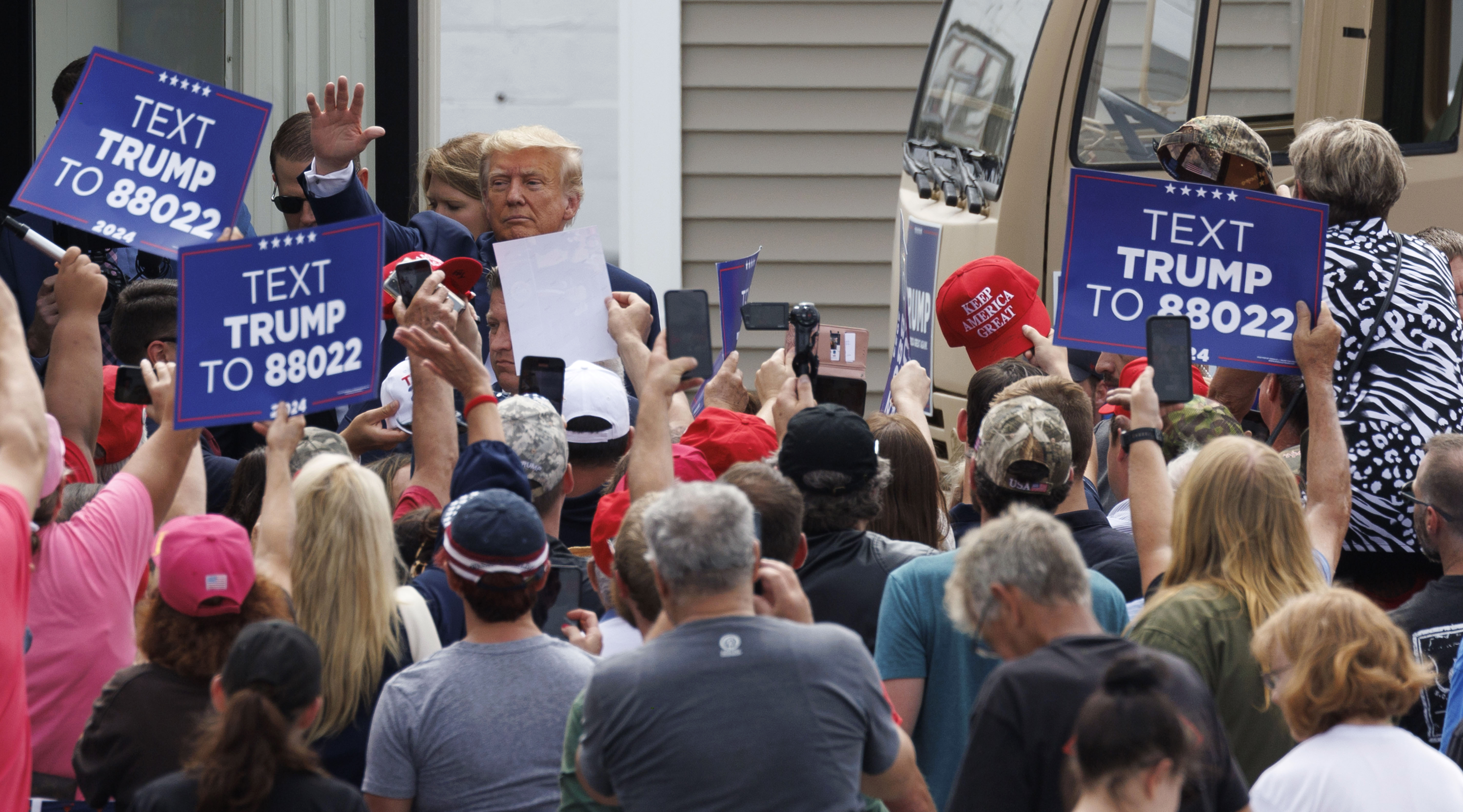 Donald Trump attends opening of New Hampshire campaign headquarters