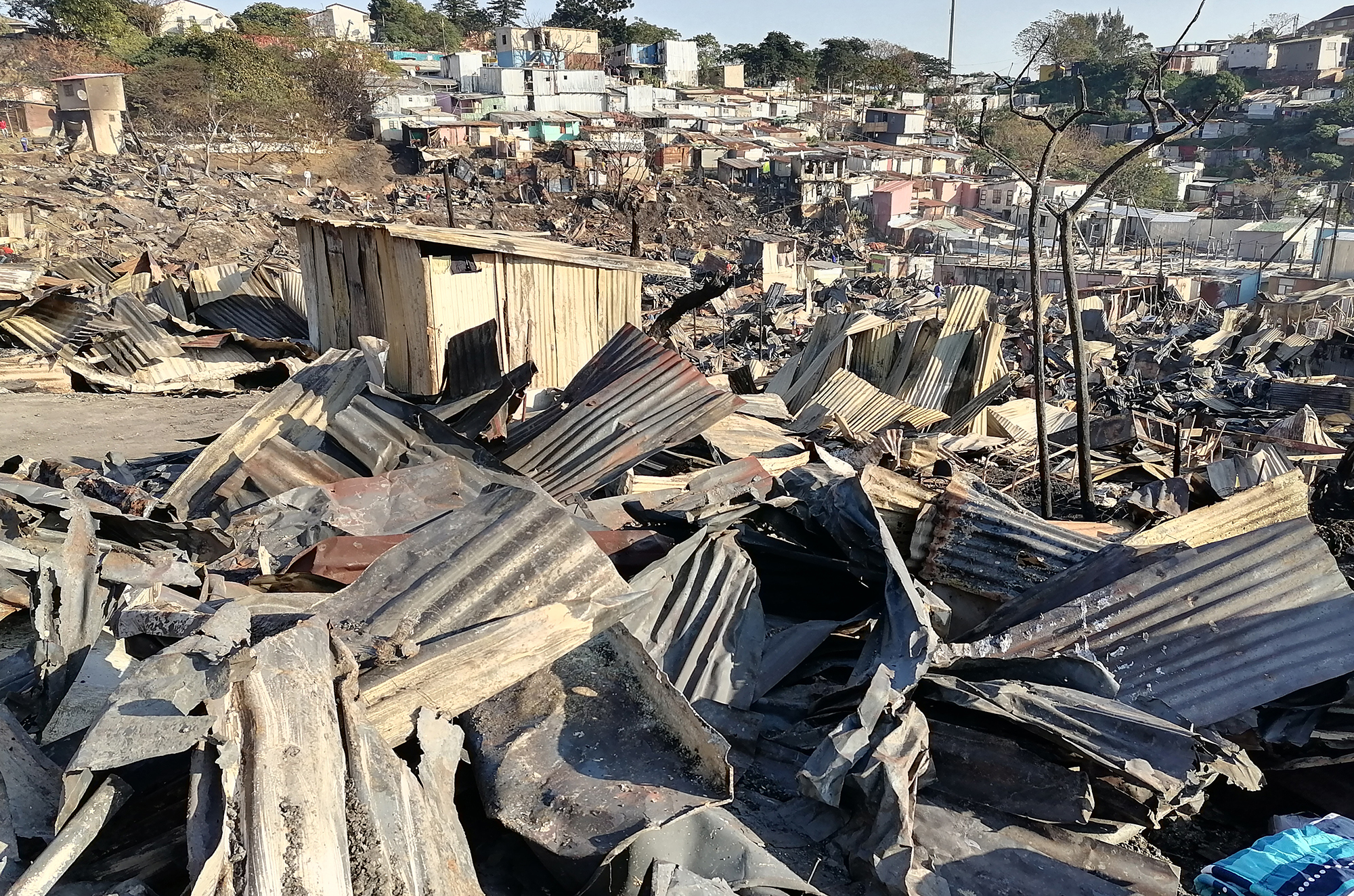 Disaster response teams descend on Durban's Kennedy Road shack fire site as thousands left homeless