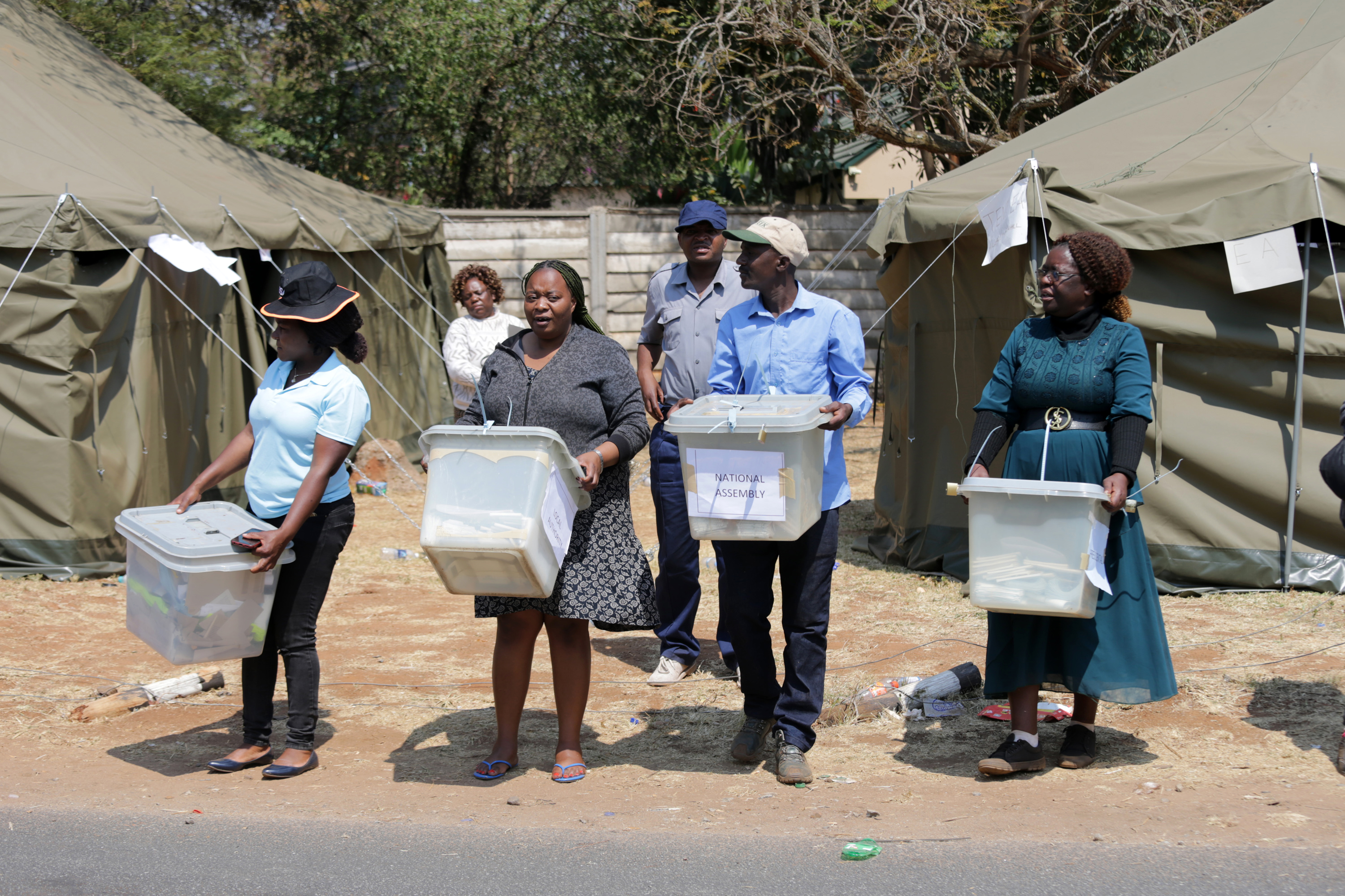 Counting of ballots begins in Zimbabwe despite extending voting