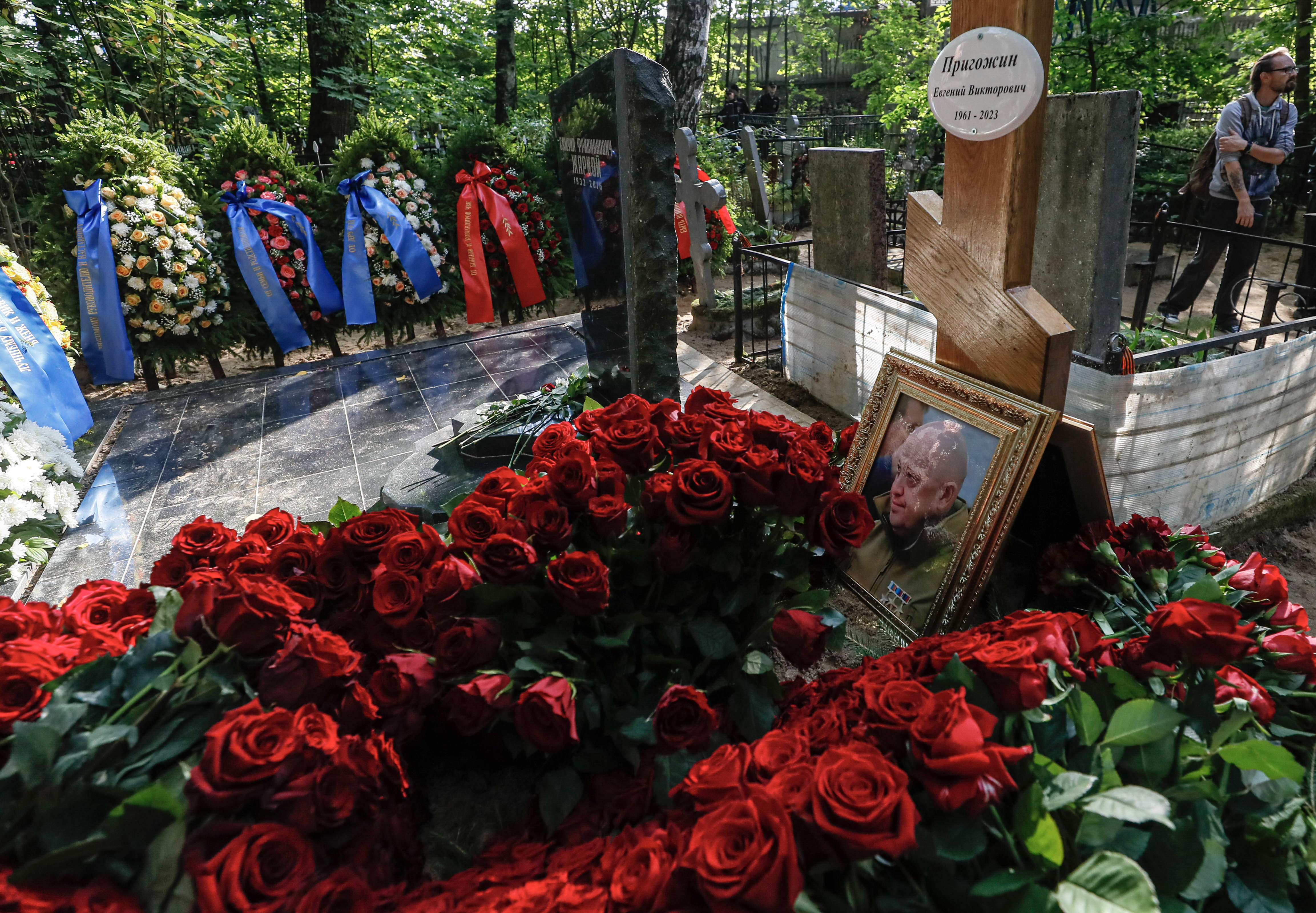 People visit the grave of PMC Wagner group chief Prigozhin in St. Petersburg