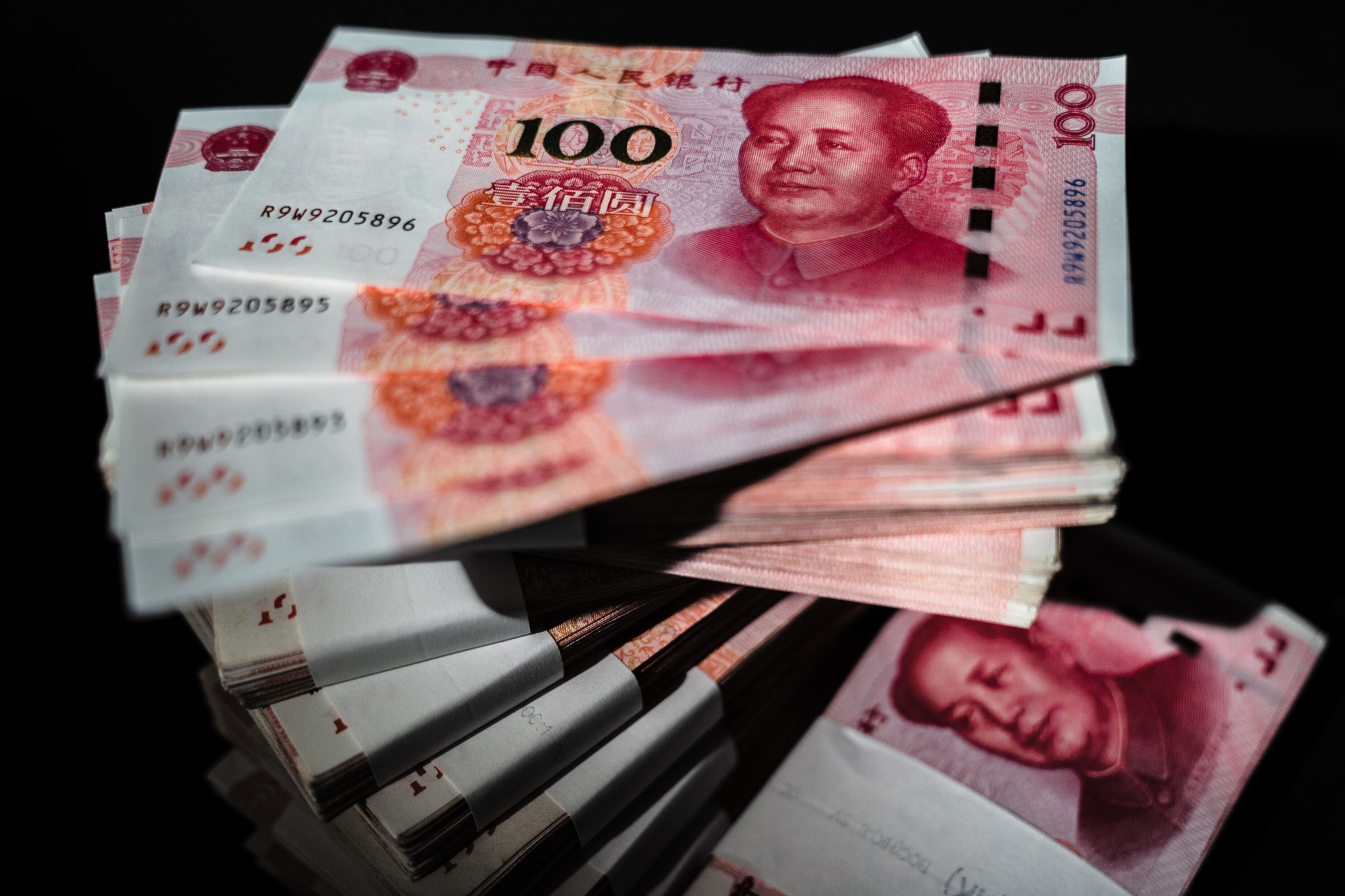 Chinese Yuan Banknotes As China Rolls Over Policy Loans With Party Congress Underway