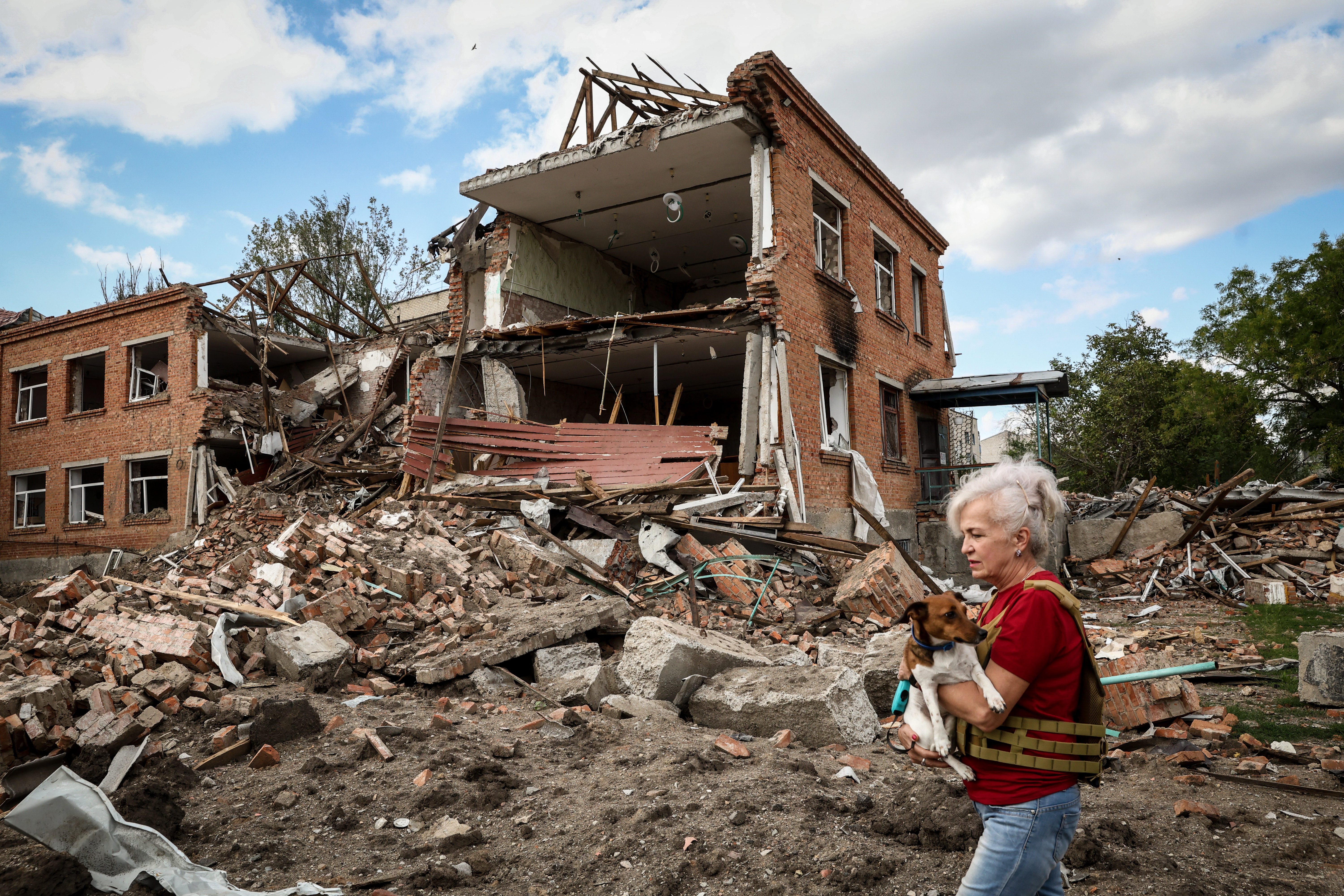 Ukrainian airstrike survivor keeps visiting war-torn hometown near Russian positions