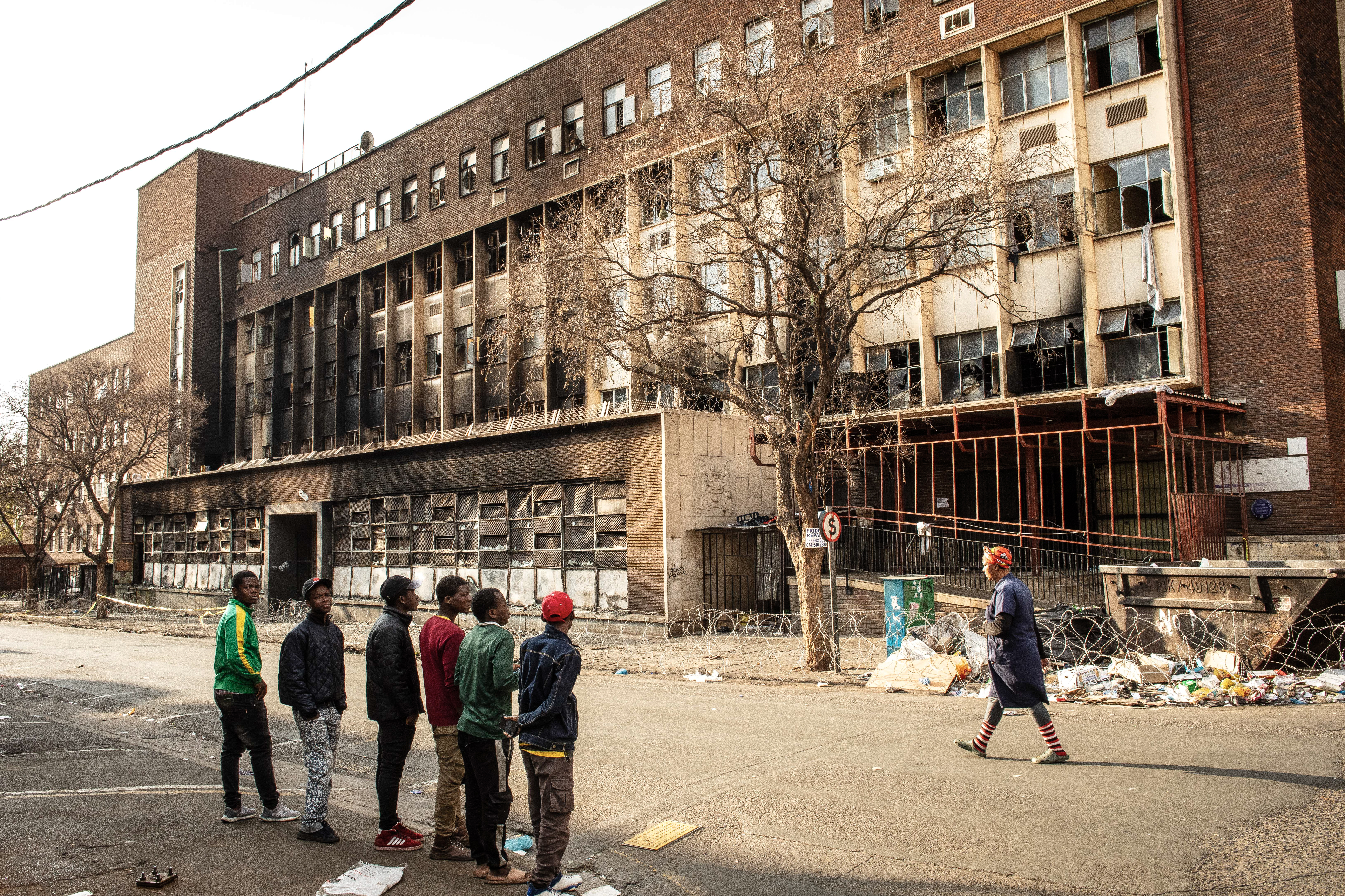 One day after deadly fire ravages building in Johannesburg