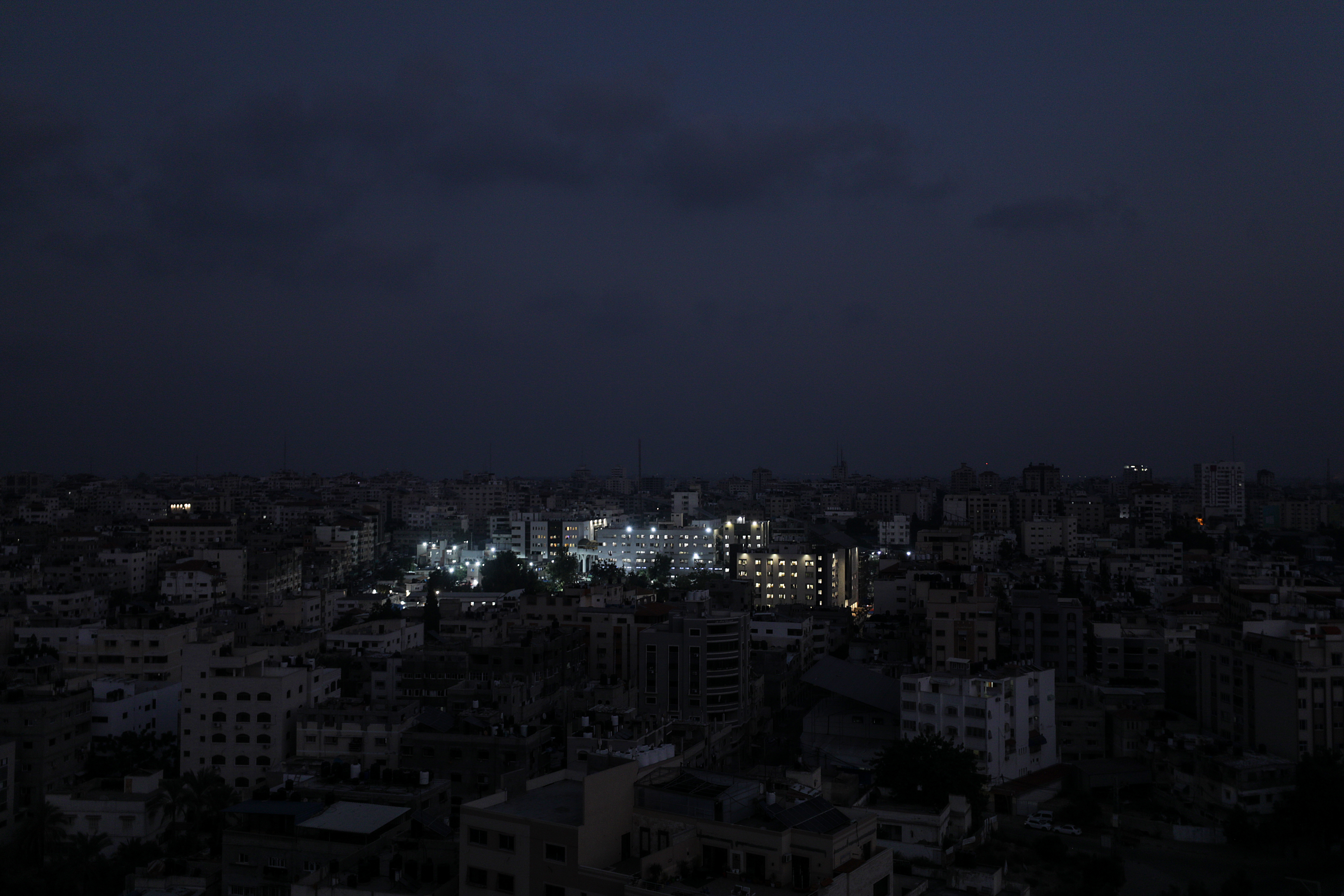 Al Shifa hospital is lit up in Gaza City