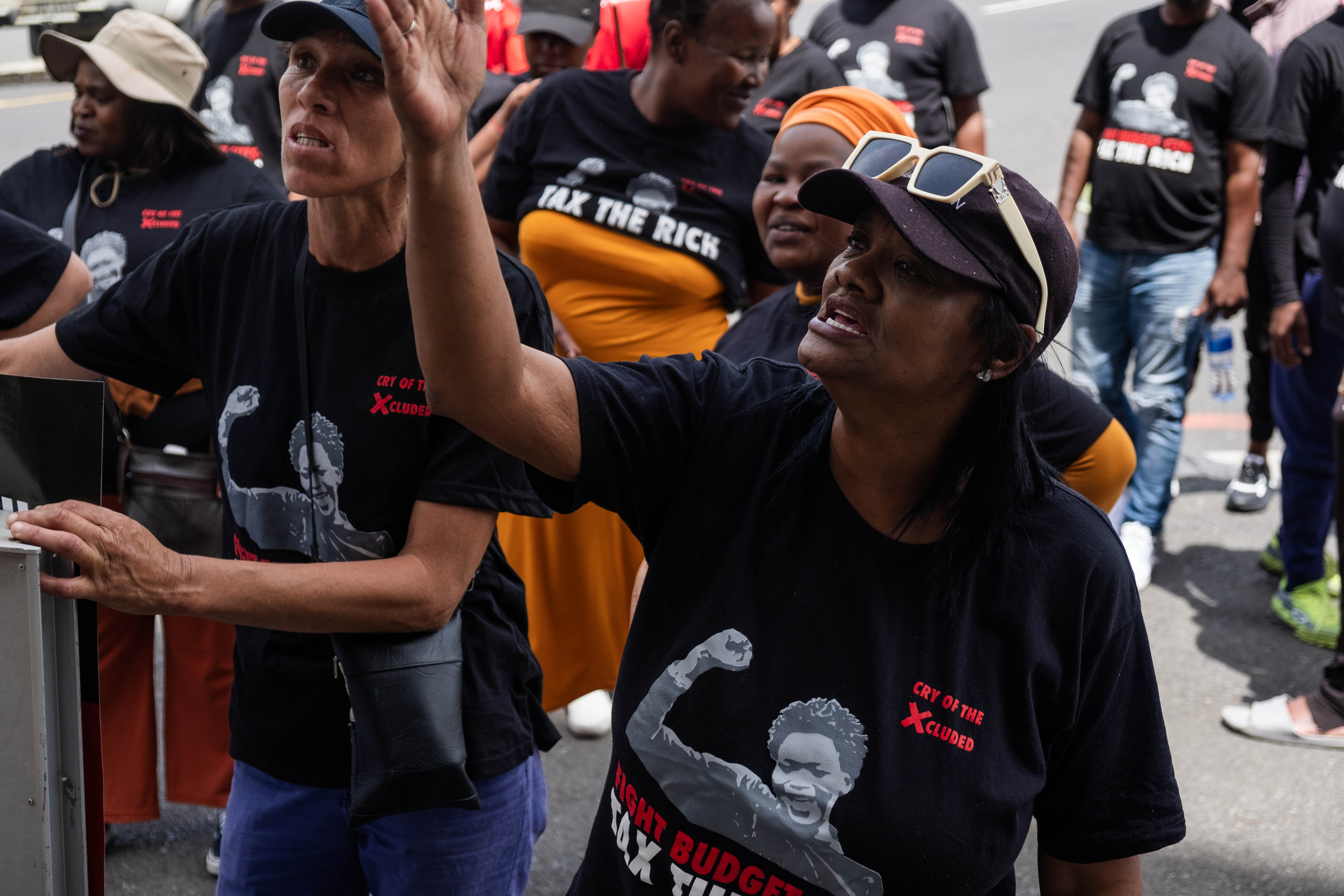 Budget cuts cost us, say anti-austerity protesters demanding universal income grant