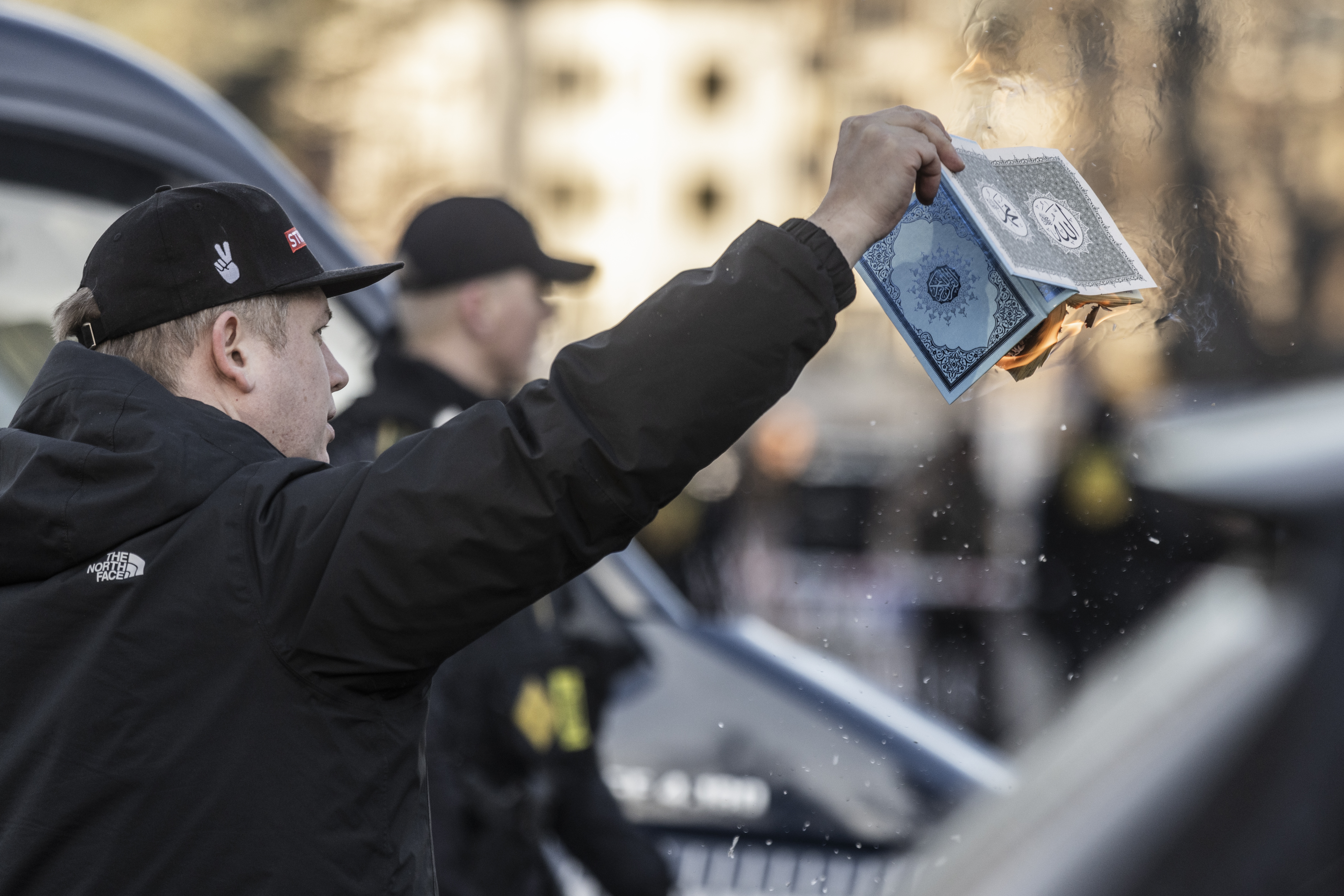 Ultranationalist, far-right extremist Rasmus Paludan burns copy of Koran in Copenhagen