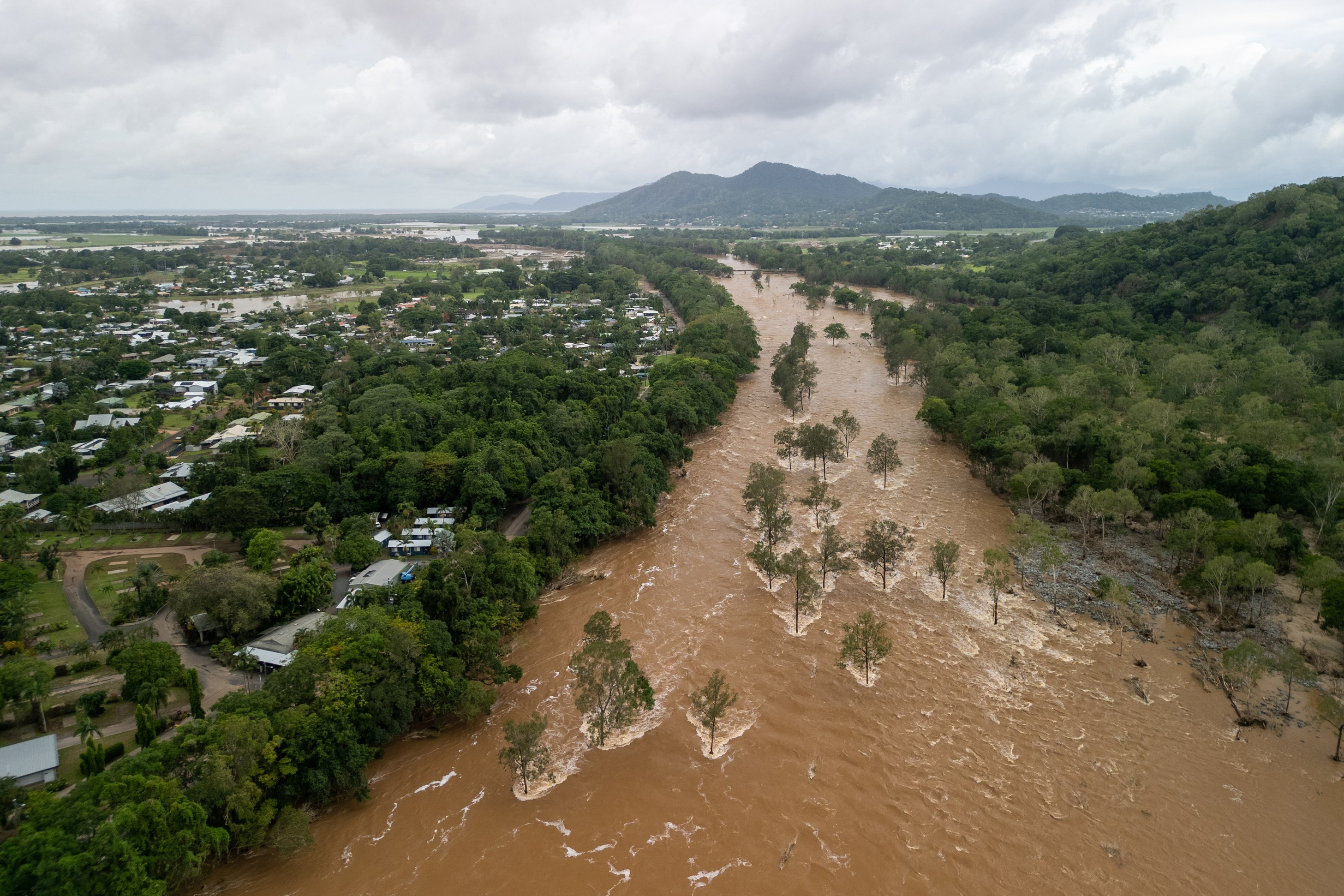 Australia's Cairns suffers significant damage by floodwaters from ex-cyclone Jasper
