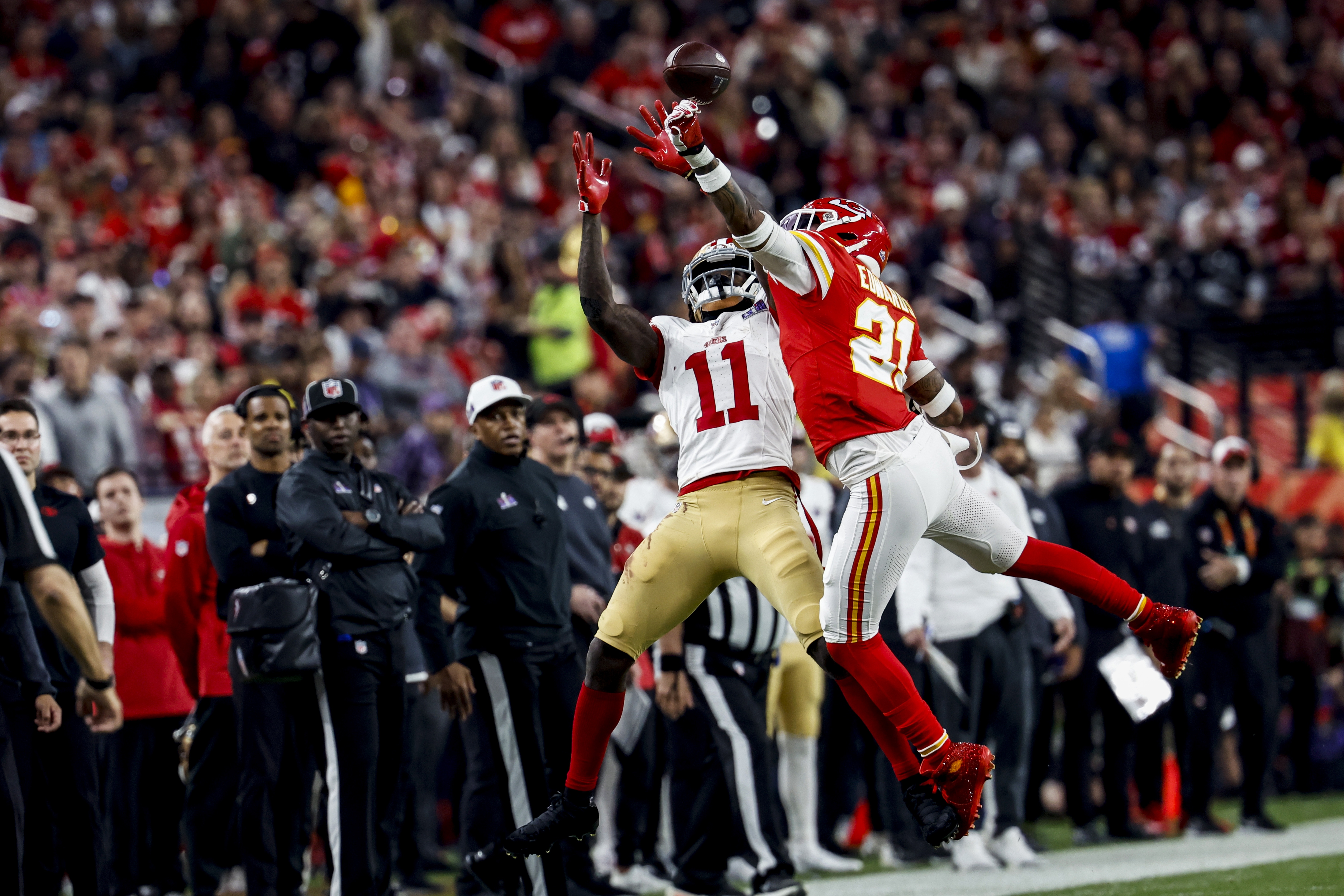 Kansas City Chiefs safety Mike Edwards (R) intercepts a pass meant for San Francisco 49ers wide receiver Brandon Aiyuk during the second half of Super Bowl LVIII between the Kansas City Chiefs and the San Francisco 49ers at Allegiant Stadium in Las Vegas, Nevada, USA, 11 February 2024. The Super Bowl is the annual championship game of the NFL between the AFC Champion and the NFC Champion and has been held every year since 1967.  EPA-EFE/JOHN G. MABANGLO