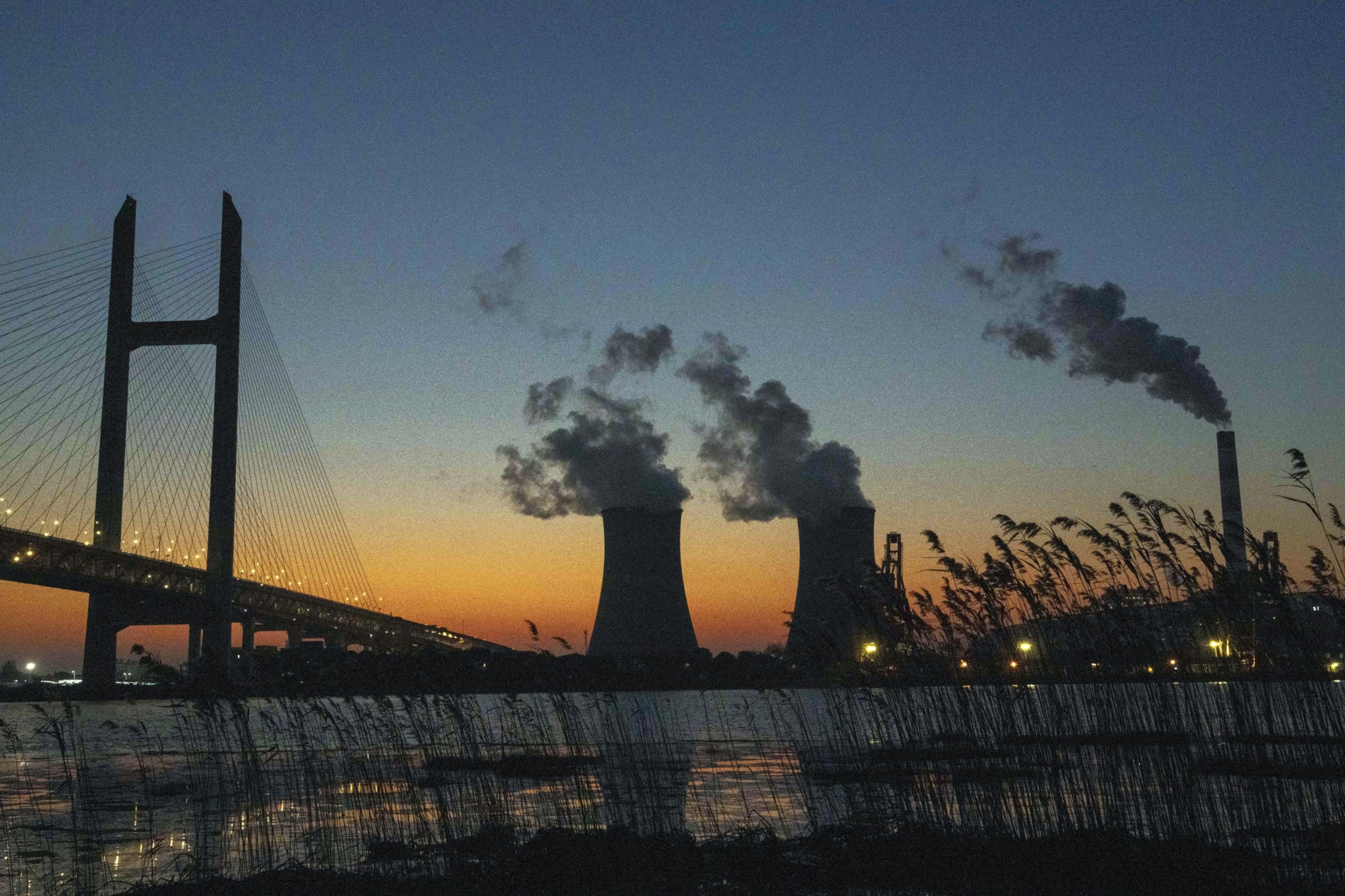 China tightens rules on polluters before carbon market expansion