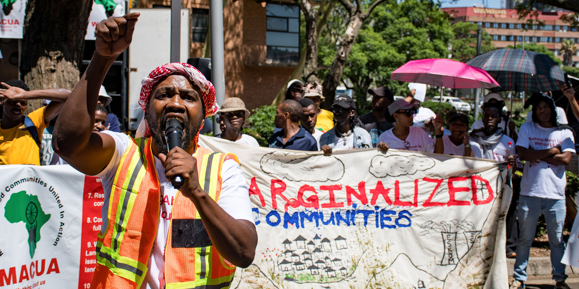 ‘Nothing about us, without us,’ mining-affected communities demand in protest outside DMRE offices