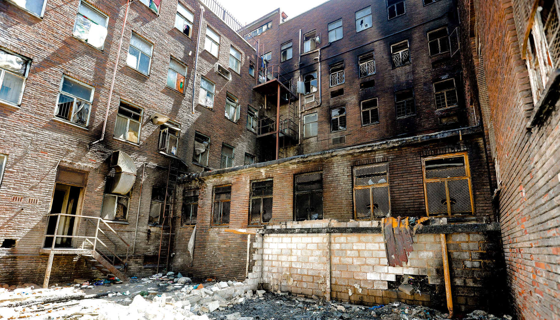 Court orders Gauteng Education Department to place 65 pupils in school after Usindiso fire