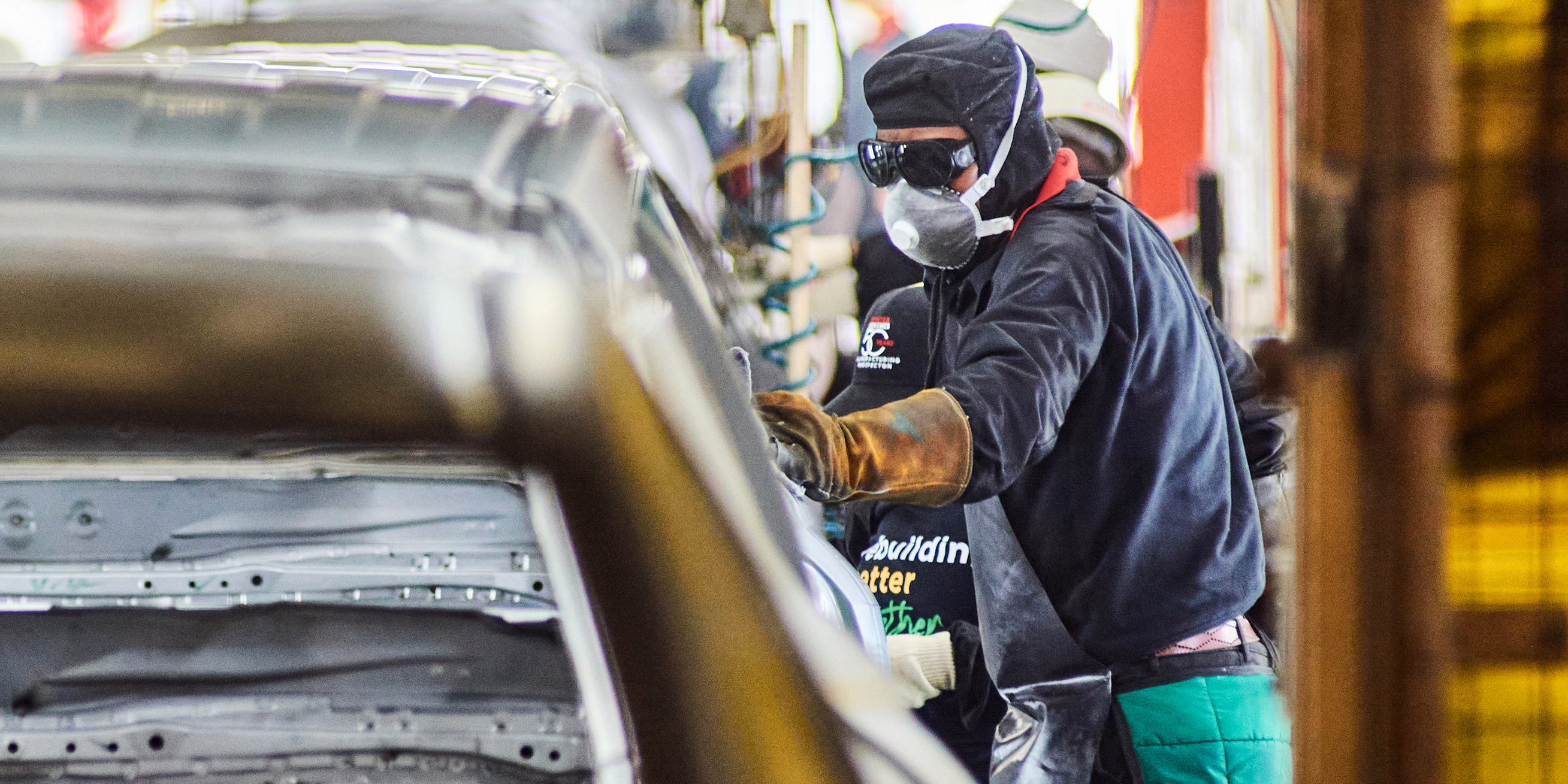 A worker attends to a steel automobile chassis on the production line at a manufacturing plant in Durban, South Africa, on Tuesday, 16 August 2022. (Photo: Waldo Swiegers/Bloomberg via Getty Images)