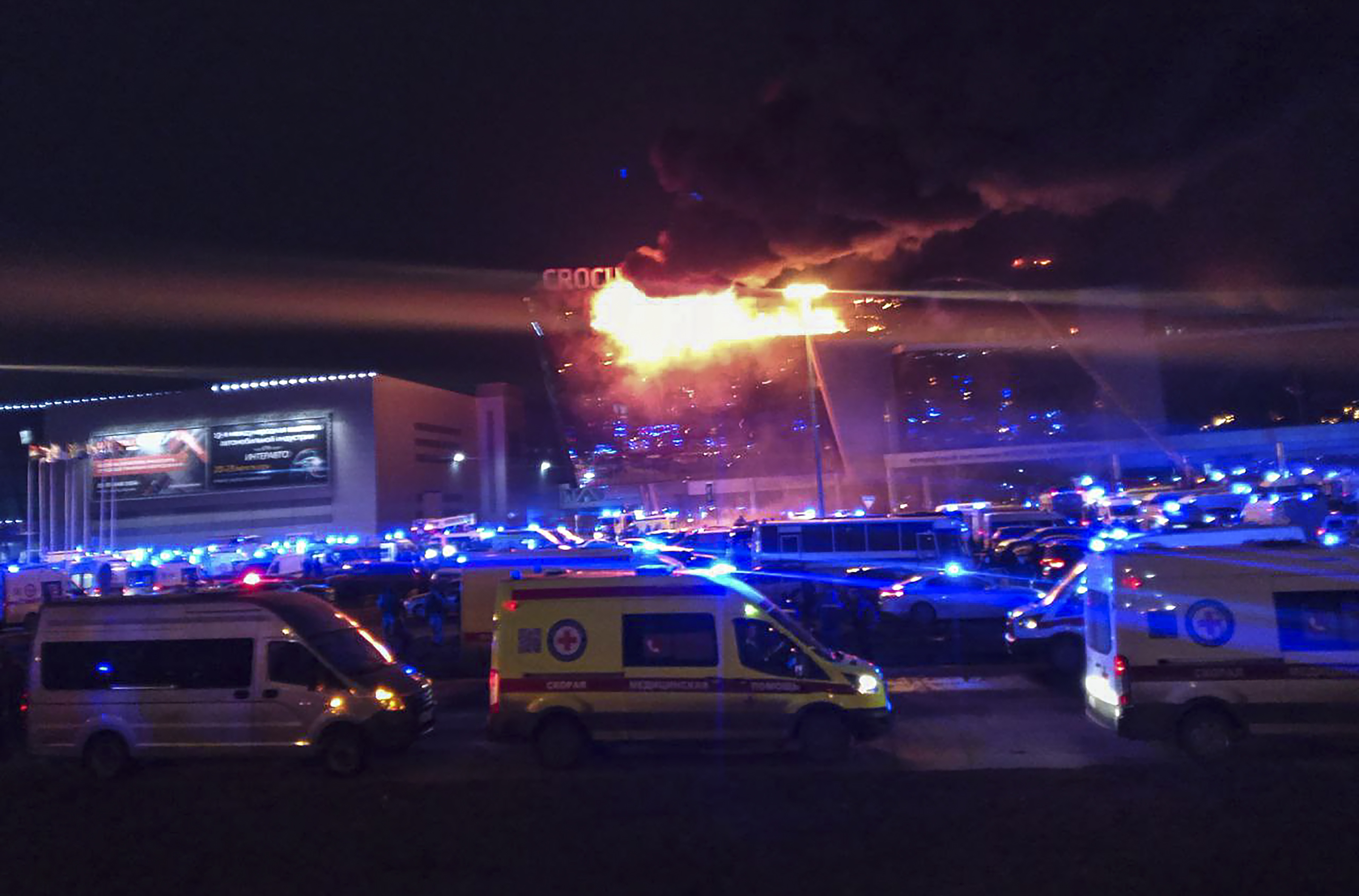 Gunmen kill at least 40 in attack at concert hall near Moscow - state news agency