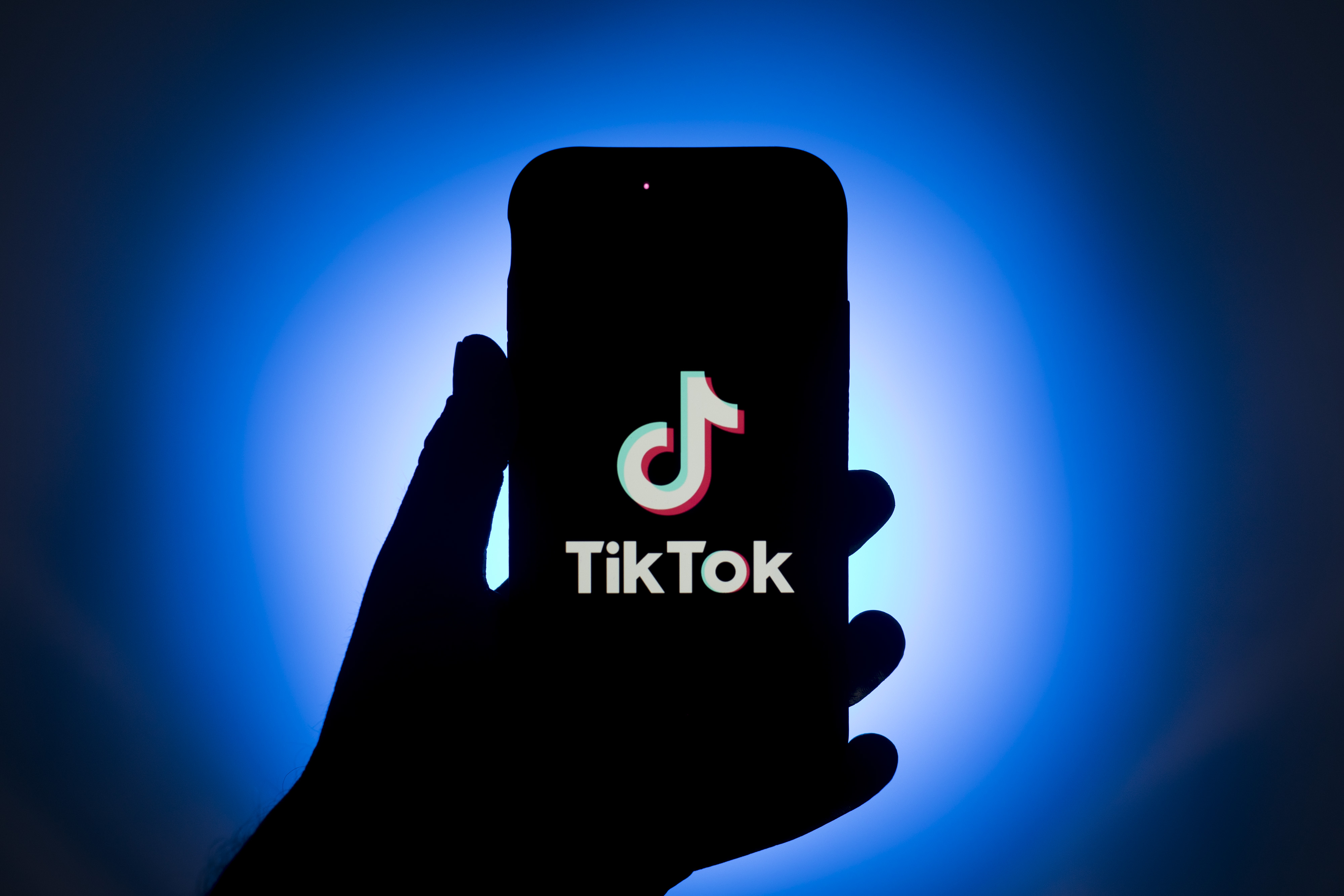 The logo for ByteDance Ltd.'s TikTok app is displayed on a smartphone in an arranged photograph in Sydney, New South Wales, Australia, on Monday Sept.14, 2020. *** SECOND SENTENCE HERE ***. Photographer: Brent Lewin/Bloomberg