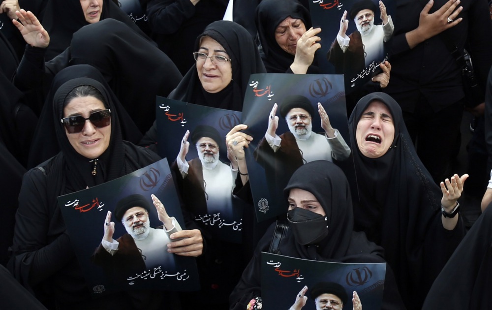 Crowds gather to mourn the late Iranian President Ebrahim Raisi, and more from around the world