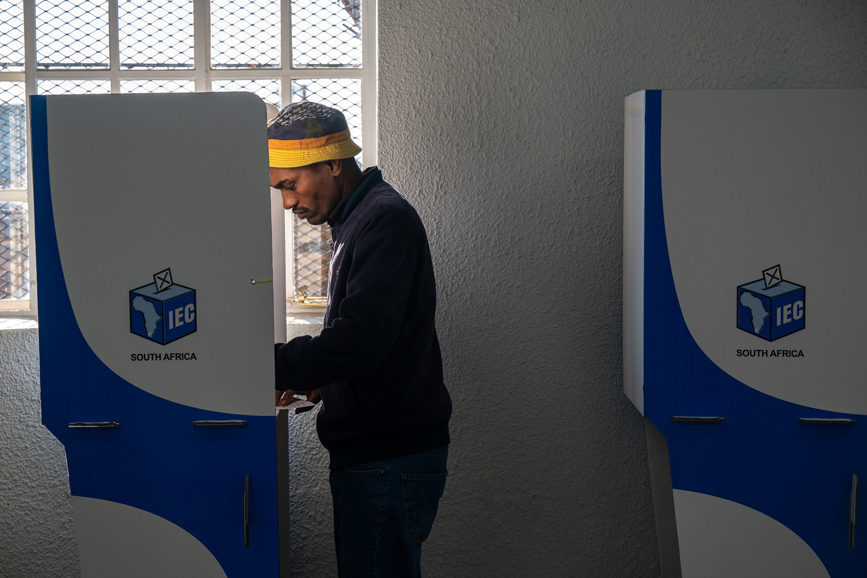 A man fills in the voting forms before casting his vote at the IEC polling station in  the St.Hubert Catholiv Church in Alexandra township, Johannesburg.
Picture: Chris Collingridge
290524.