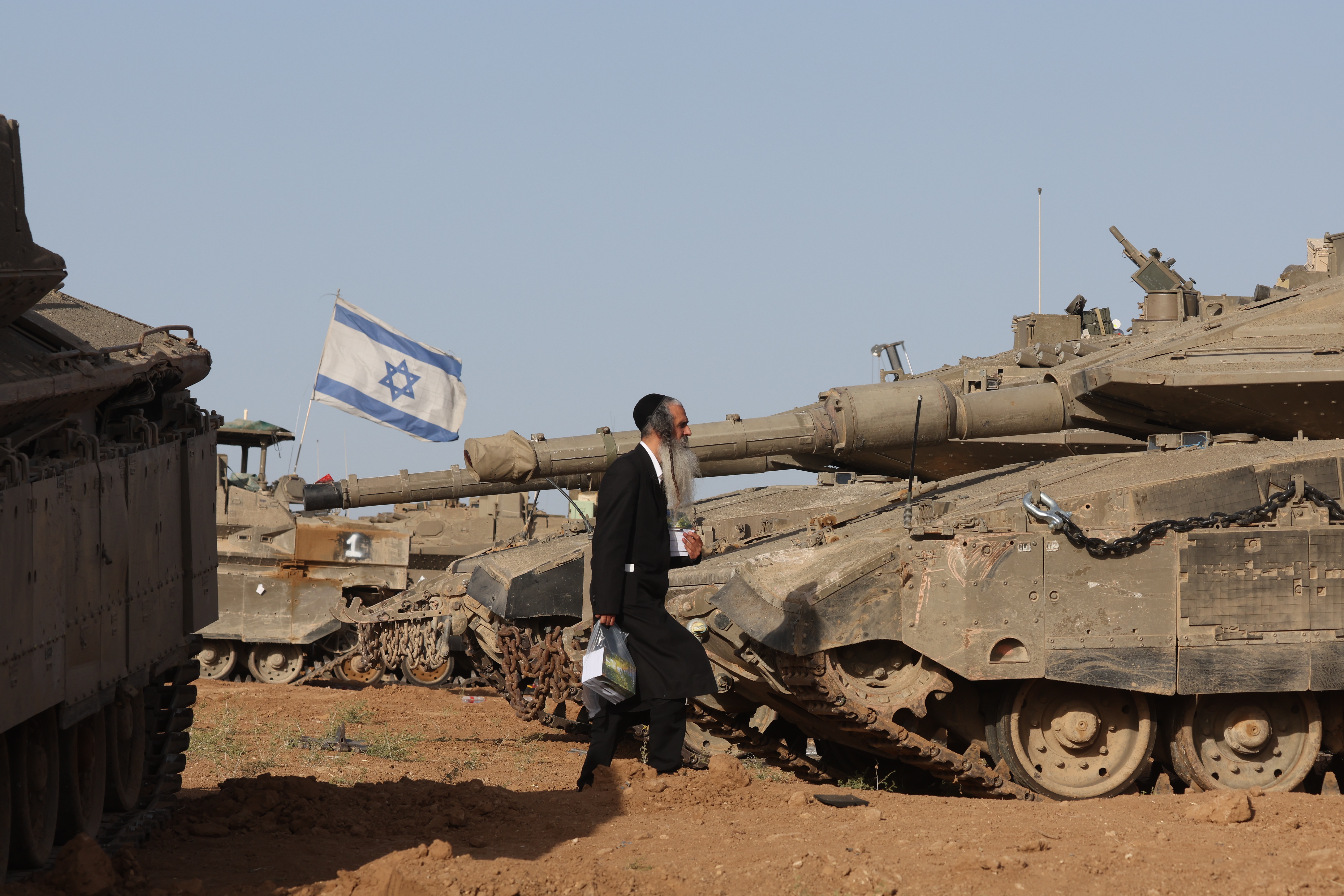 Israeli troops gather near the Gaza border, southern Israel