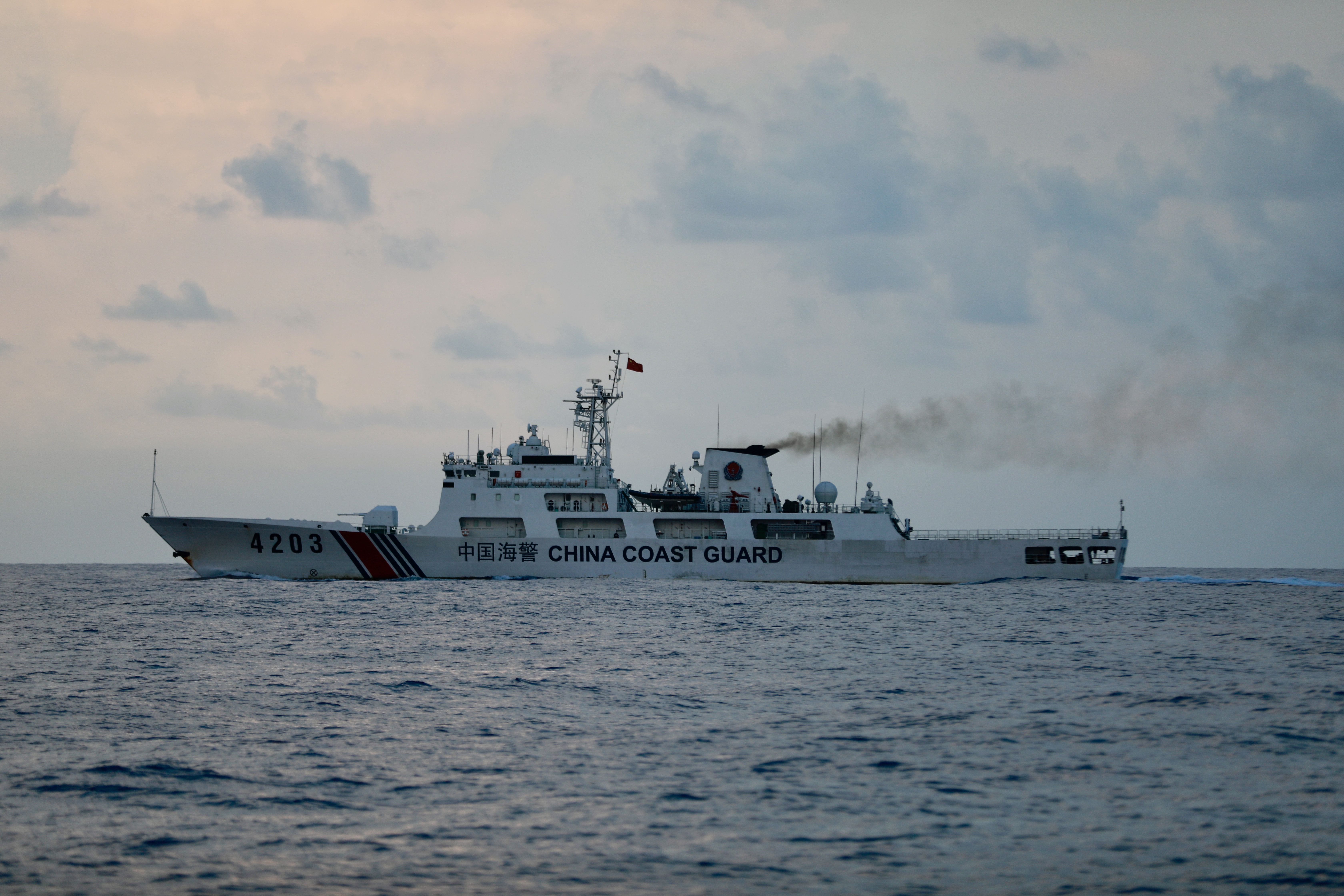 Filipino fishermen join a civilian-led supply mission to the disputed South China sea