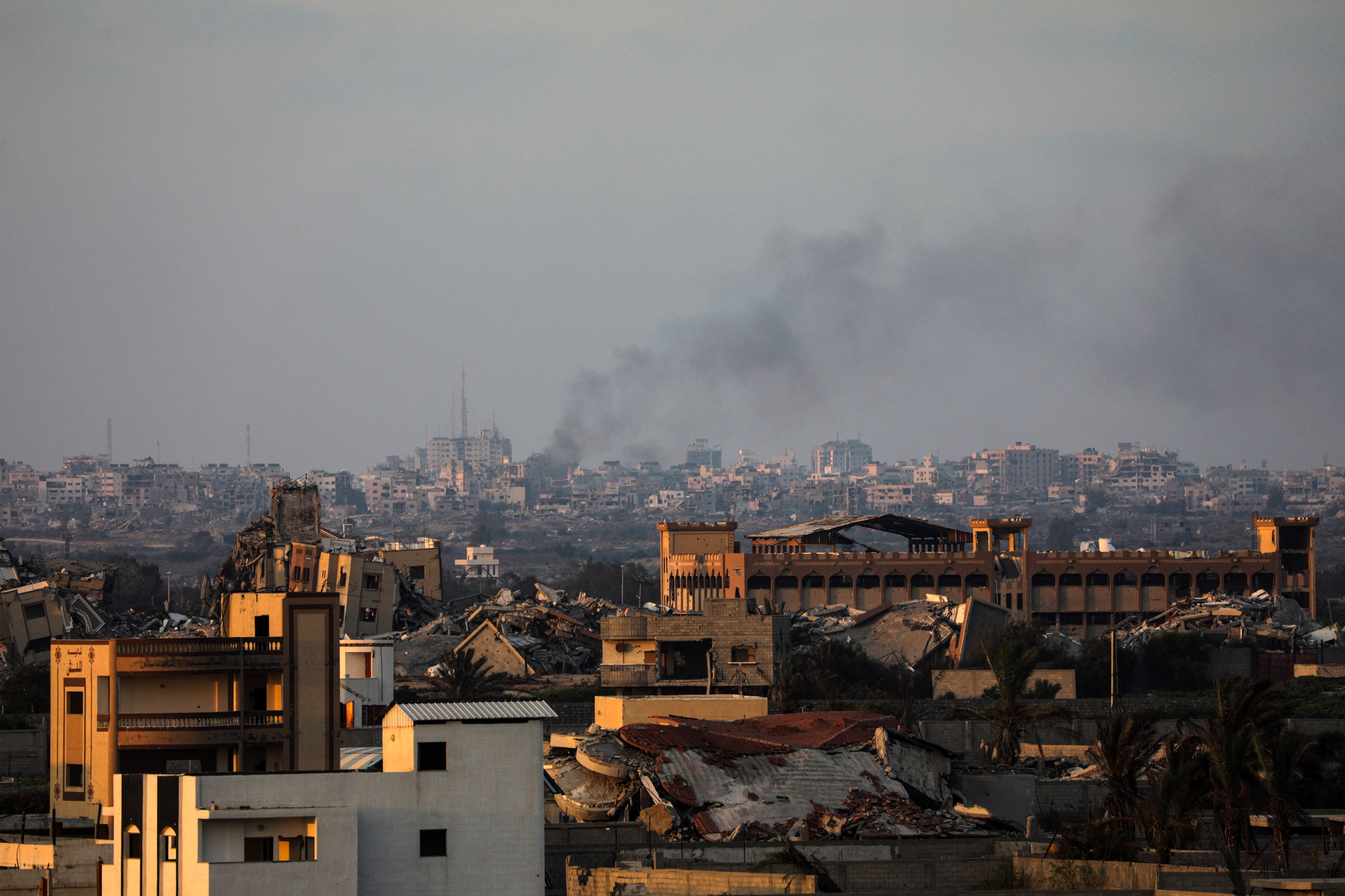 Smoke rises following an Israeli air strike in Gaza City