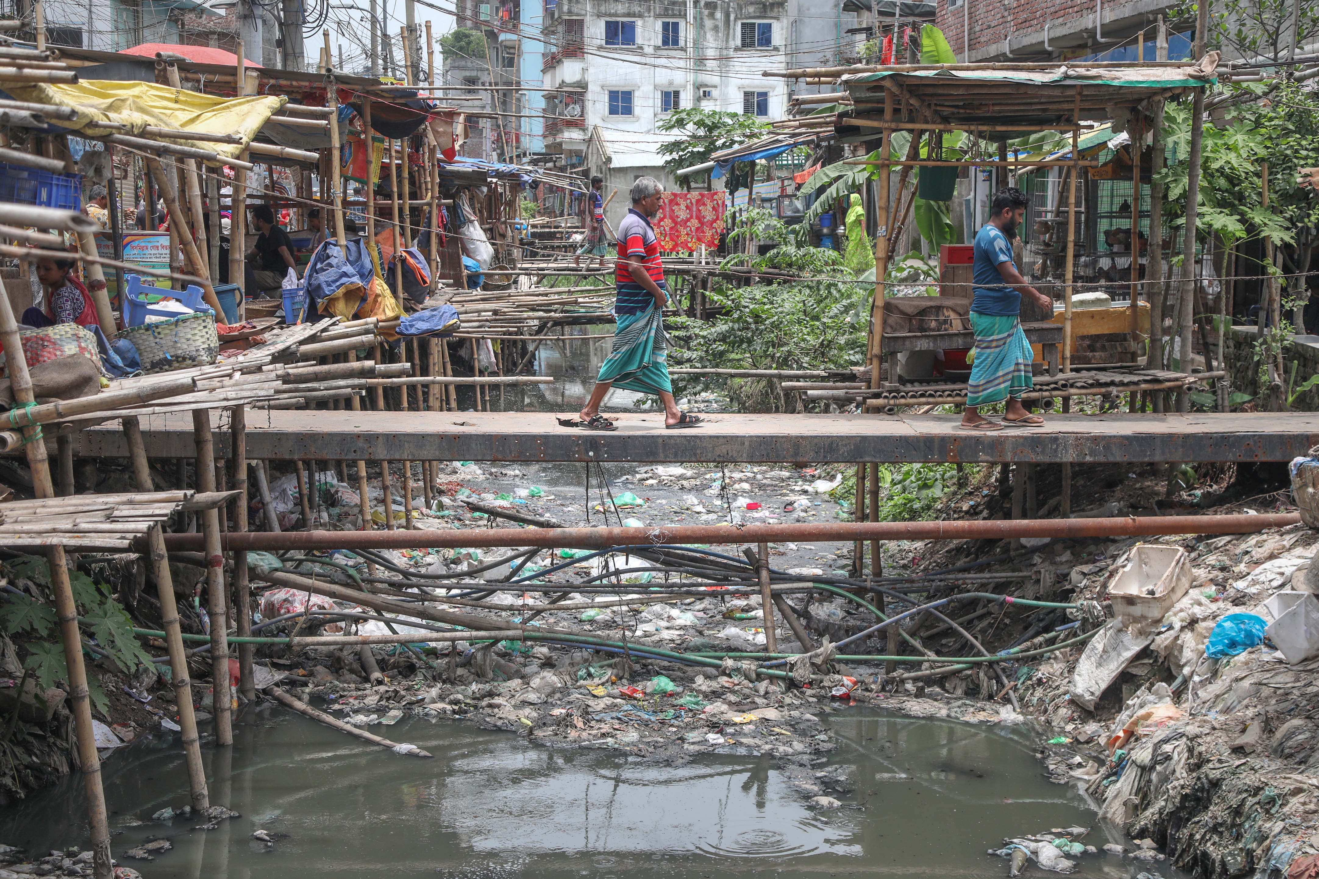 Drainage canals of Dhaka return to filthy state despite waste removal