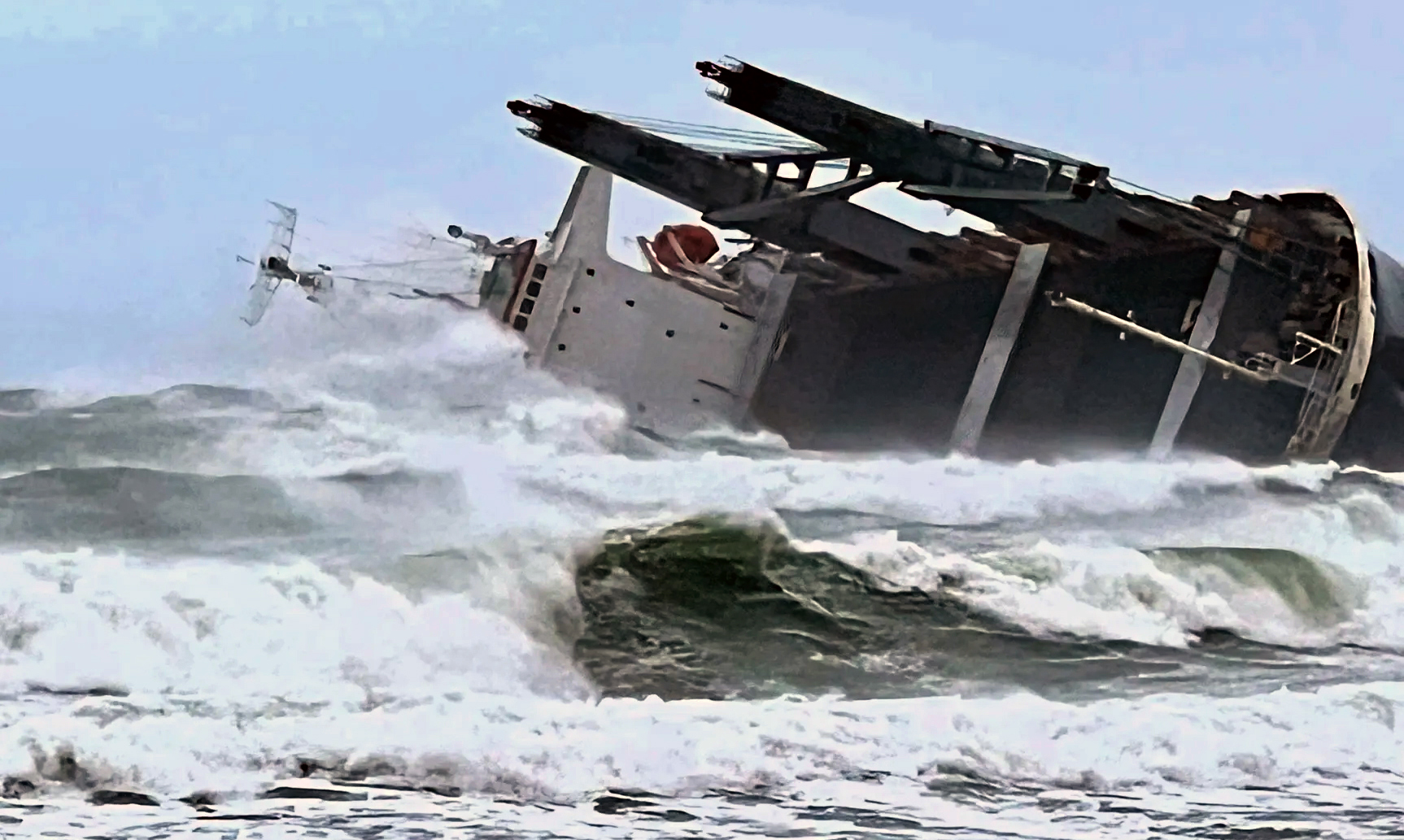 Capsized vessel — Efforts stepped up in stormy weather to prevent oil spill and to salvage cargo of fertiliser