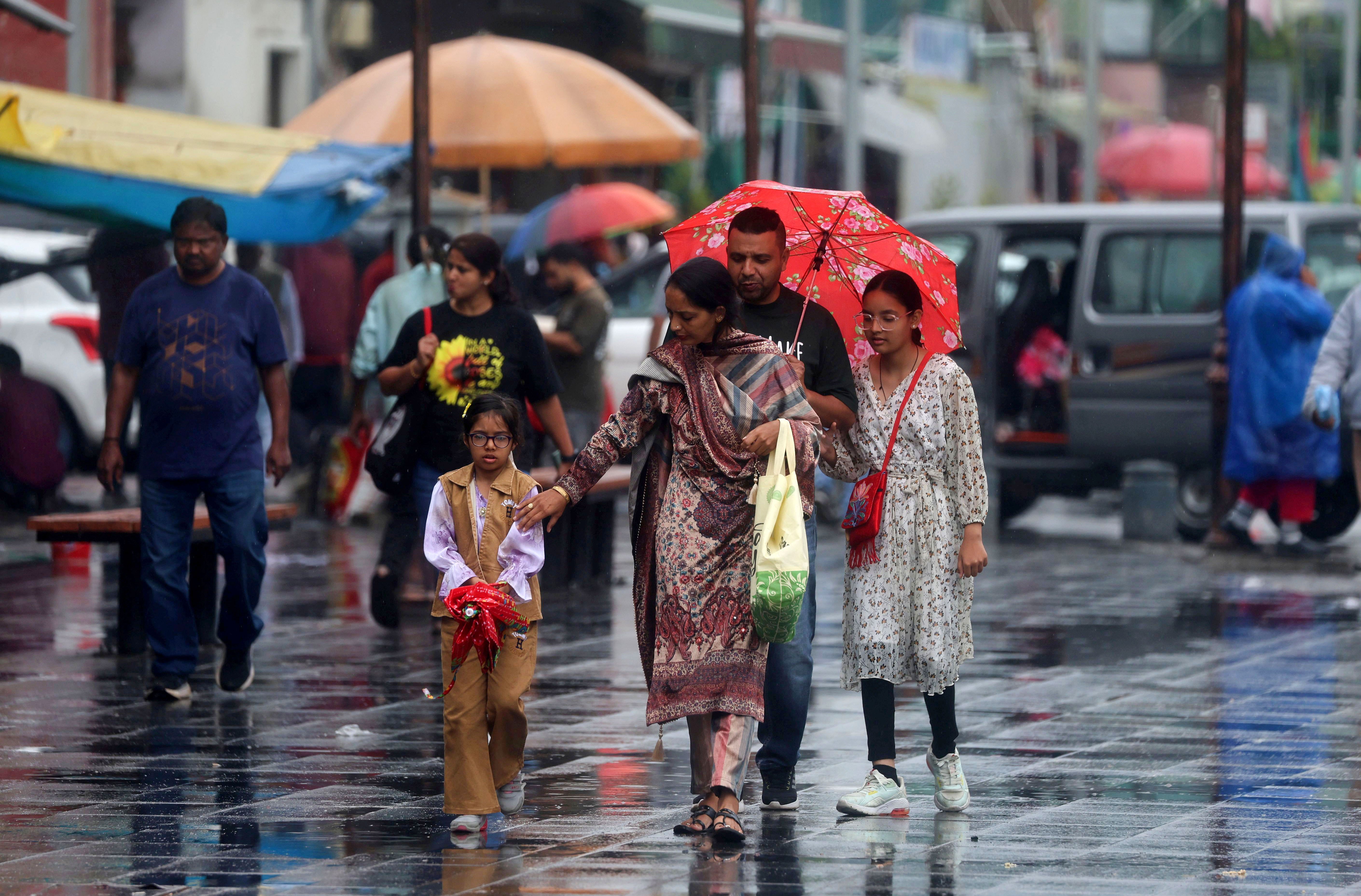 Rain reported from across Indian Kashmir