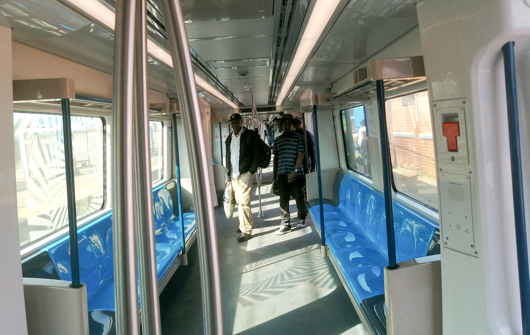 Iconic yellow trains make way for new blue People’s Train, enhancing commuter convenience and safety