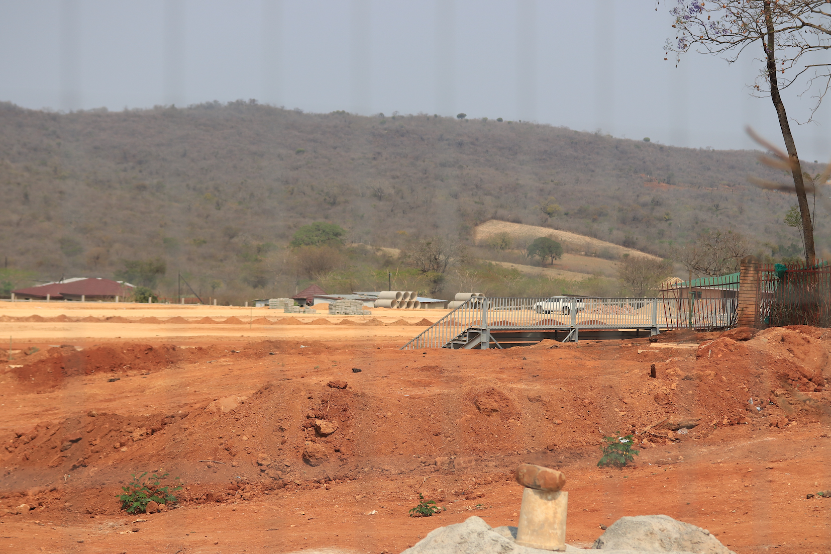 Municipality fines contractor after lengthy delays in building stadium leave community in the lurch