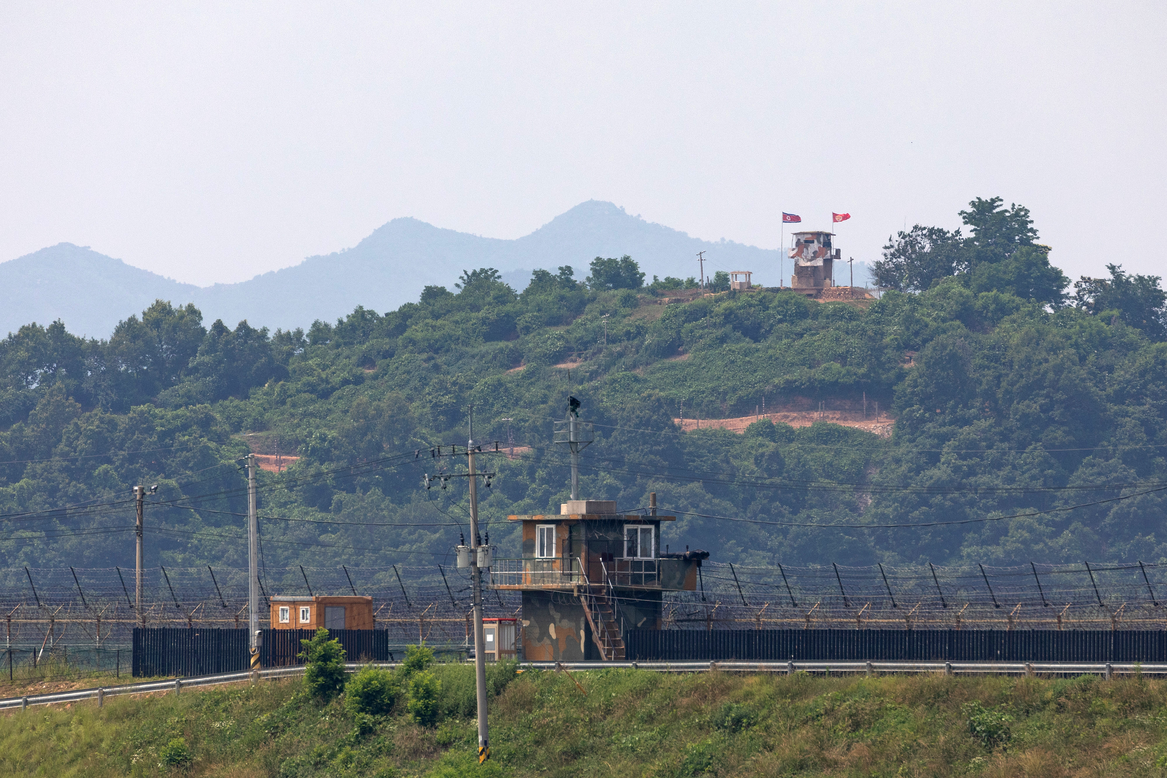 A South Korean military check point, front, and a North Korean military check point, rear, stand at the Demilitarized Zone (DMZ) in Paju, South Korea, on Wednesday, June 17, 2020. North Korea said it would deploy troops into areas on its side of the border where it had joint projects with South Korea, further escalating tensions with its neighbor a day after destroying a liaison office the two once shared. Photographer: SeongJoon Cho/Bloomberg via Getty Images