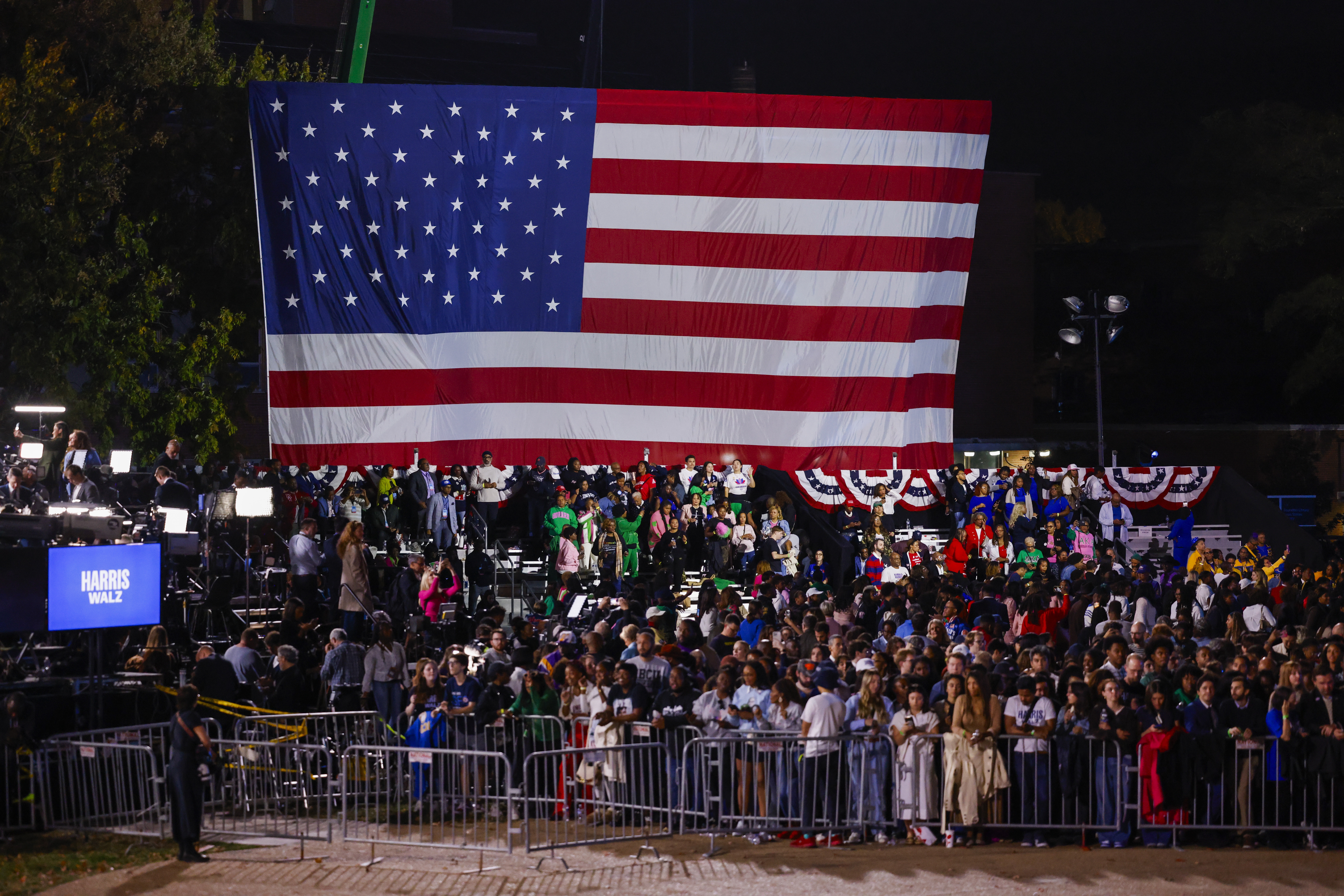 People wait for results of US 2024 presidential elections in Washington, DC