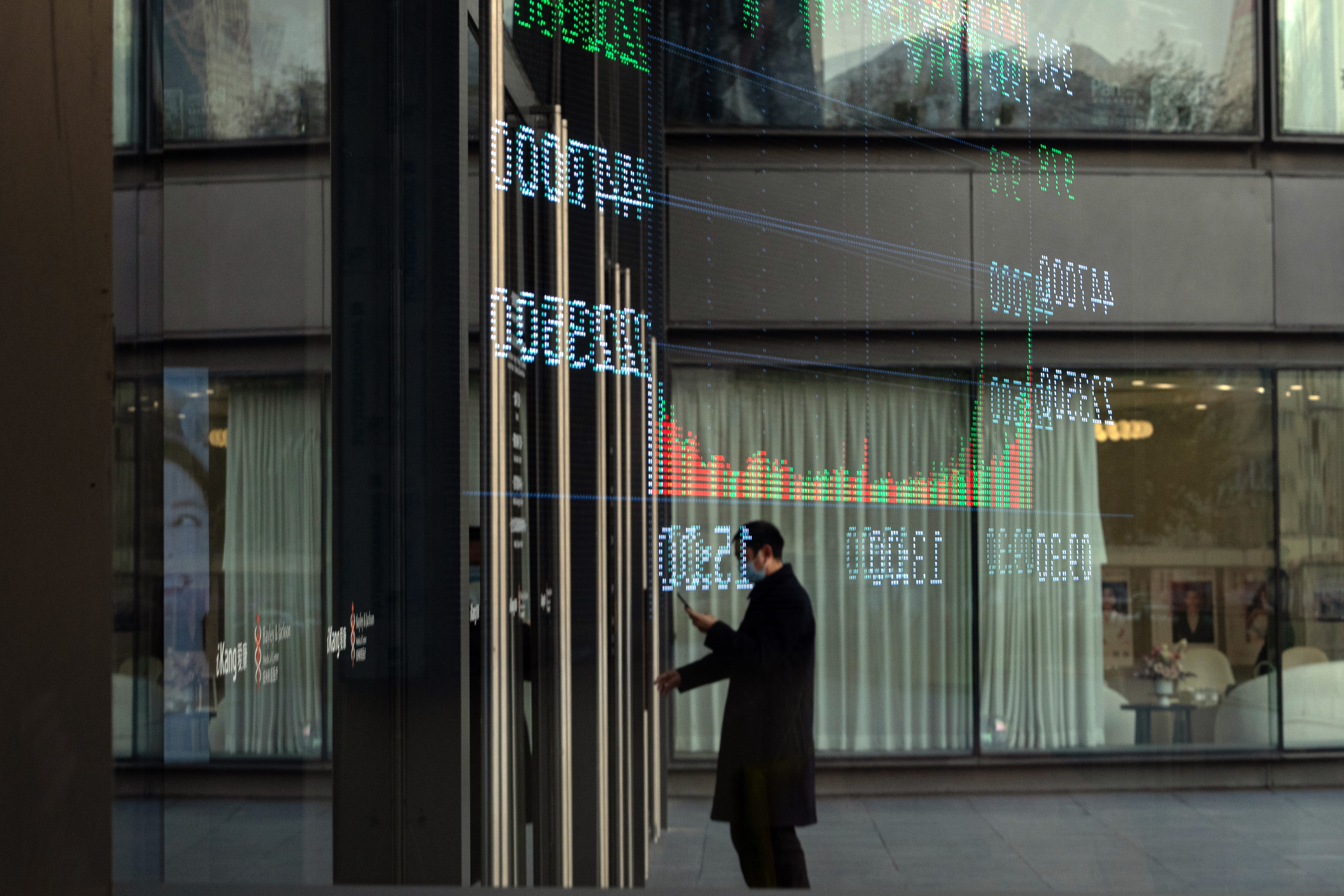 China funds trim fees as Beijing pushes reform to lift stocks