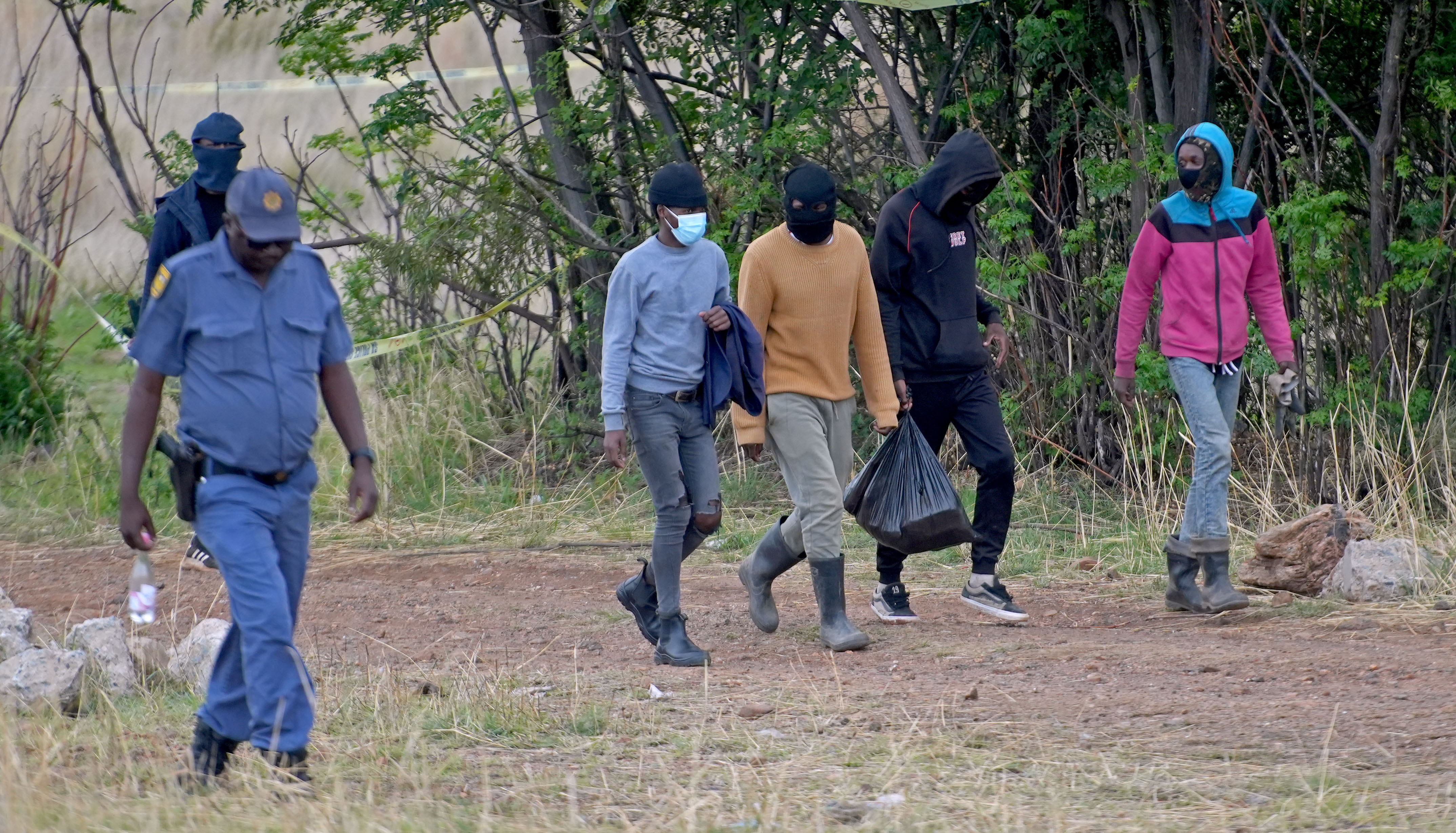 ‘Even prisoners are not left to die’ — community supports illegal miners as SAPS refuses to assist