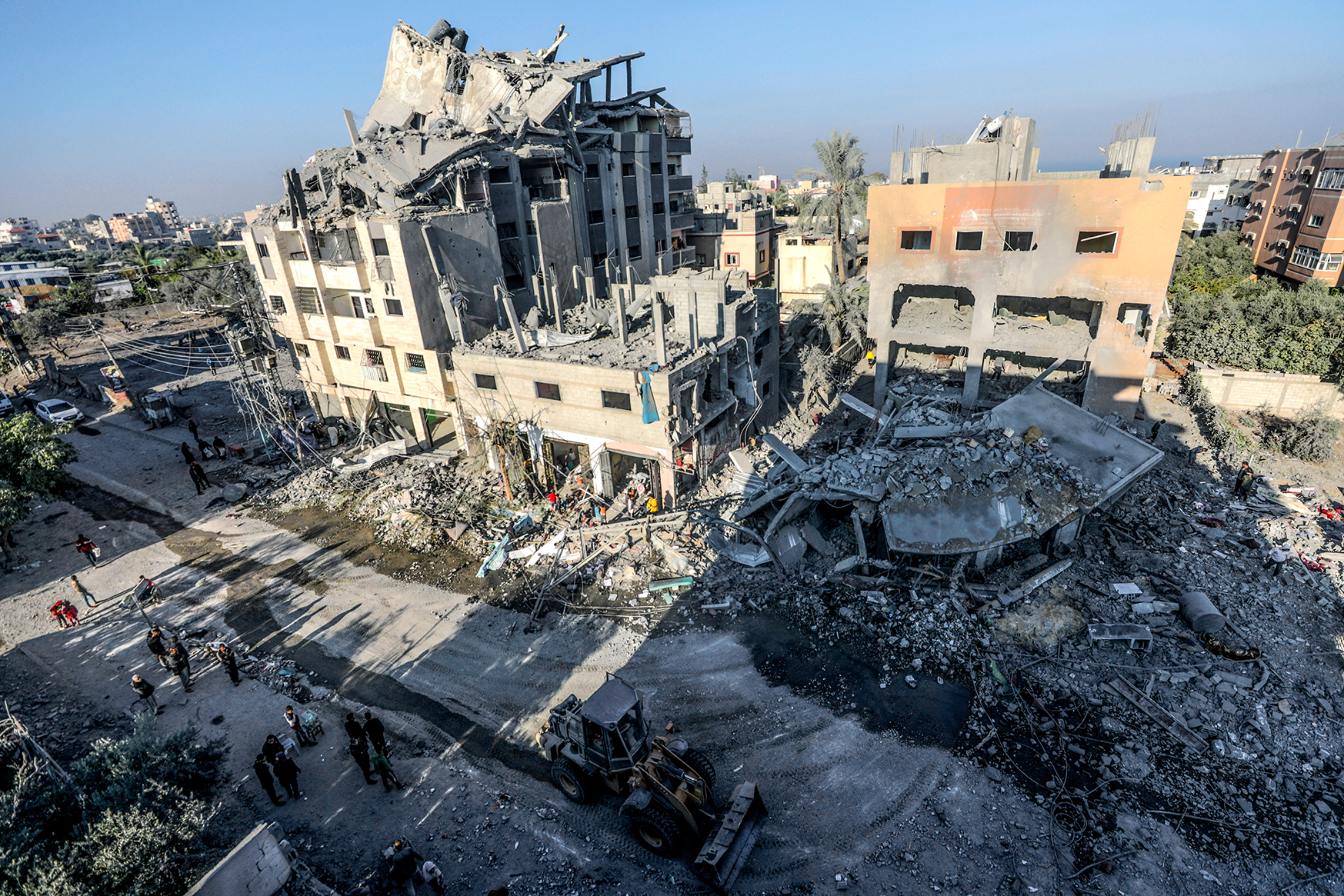 IDF bombards homes in north Gaza - medics; Hezbollah strikes Israeli military position over 'ceasefire breach'