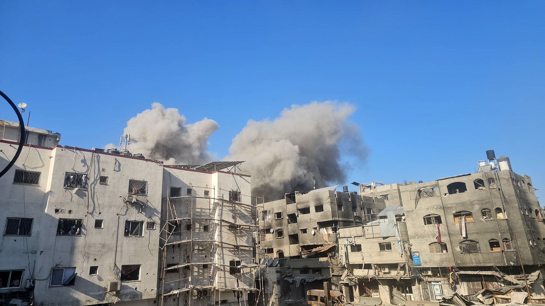 Israel kills more than 100 in strikes after soldier's death, says it still backs ceasefire