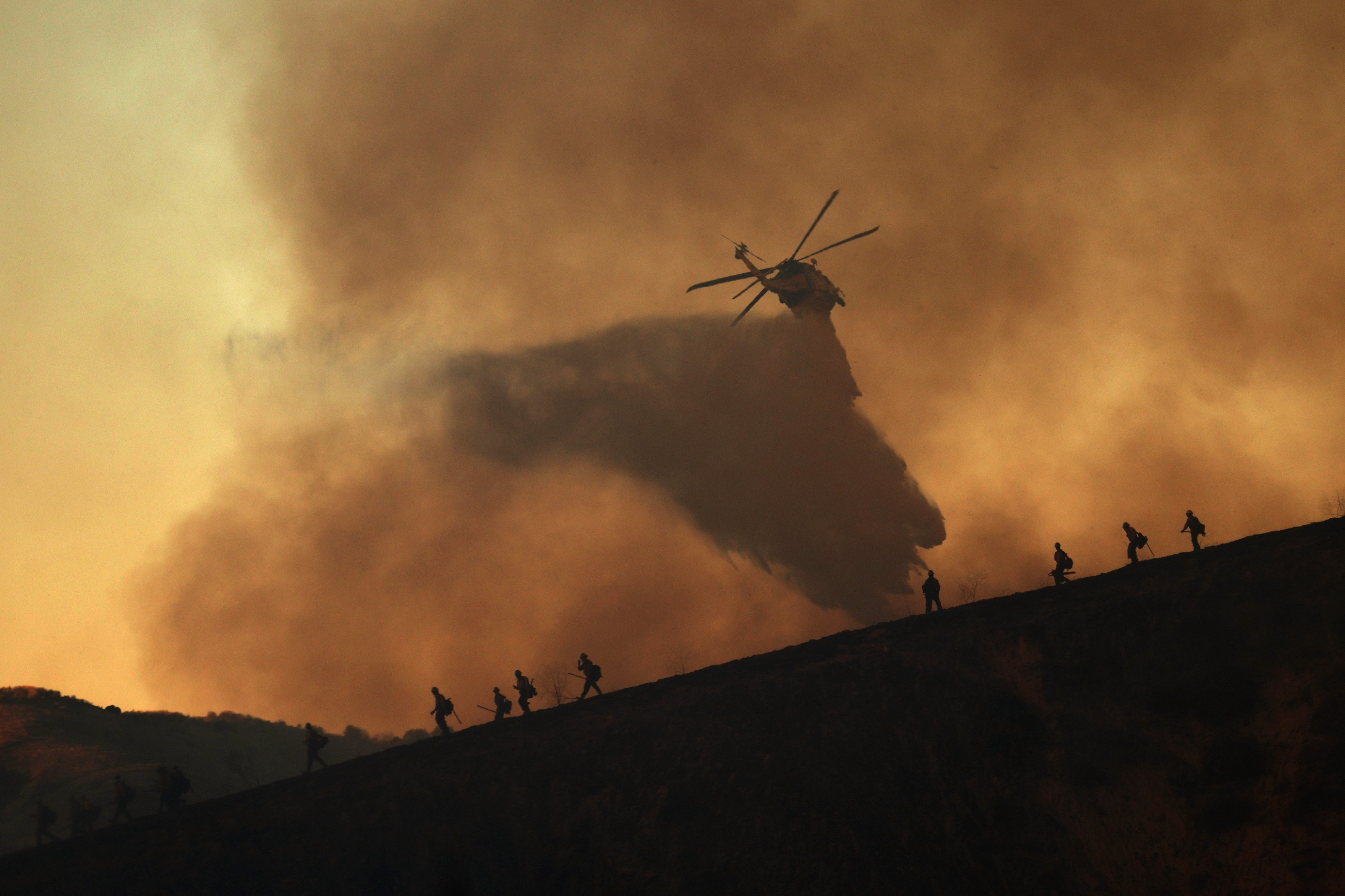 Wildfires continue to rage through Los Angeles area