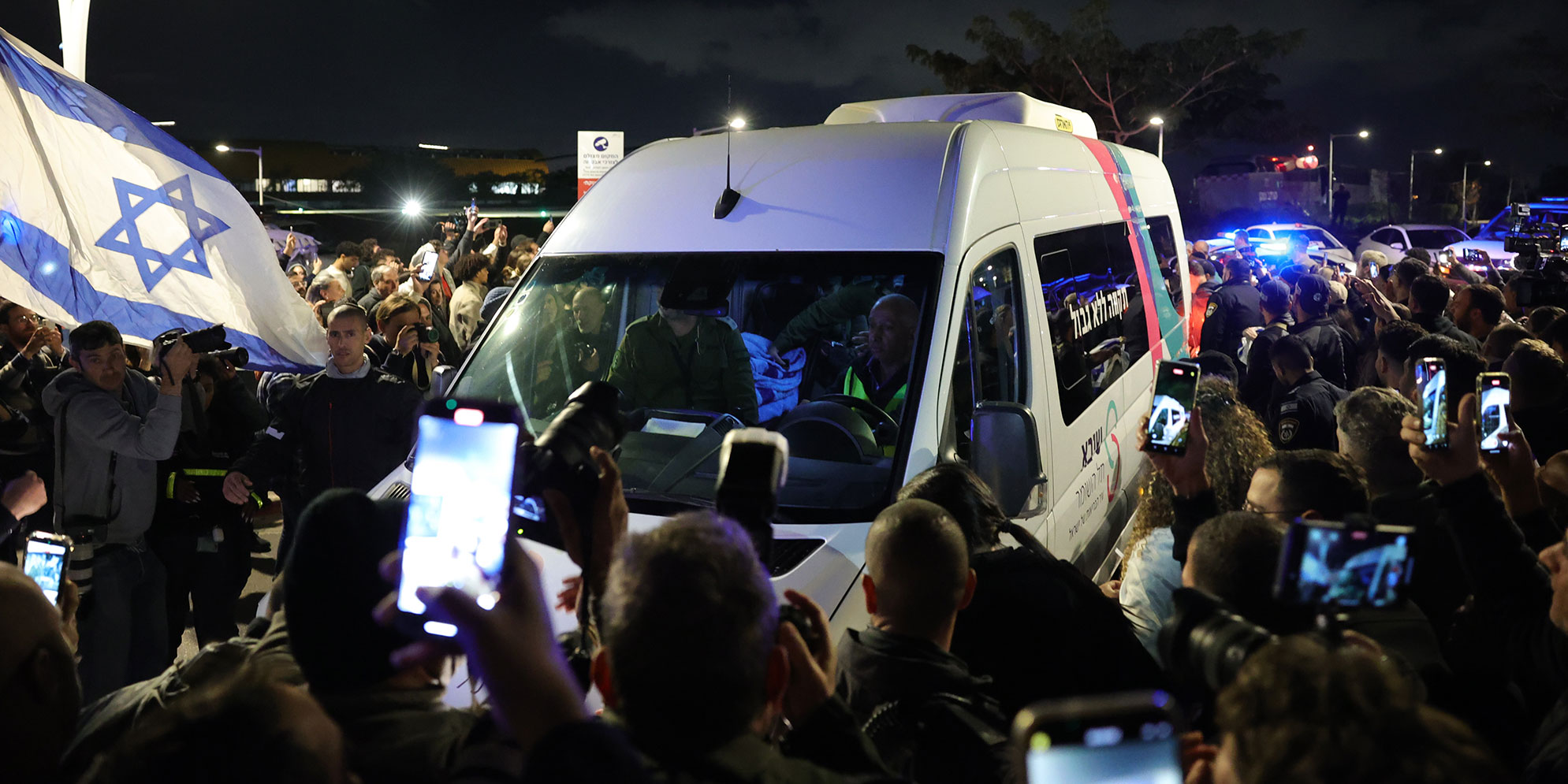 Israelis cheer release of first three Gaza hostages; Hamas’ armed wing ‘will abide by ceasefire deal’