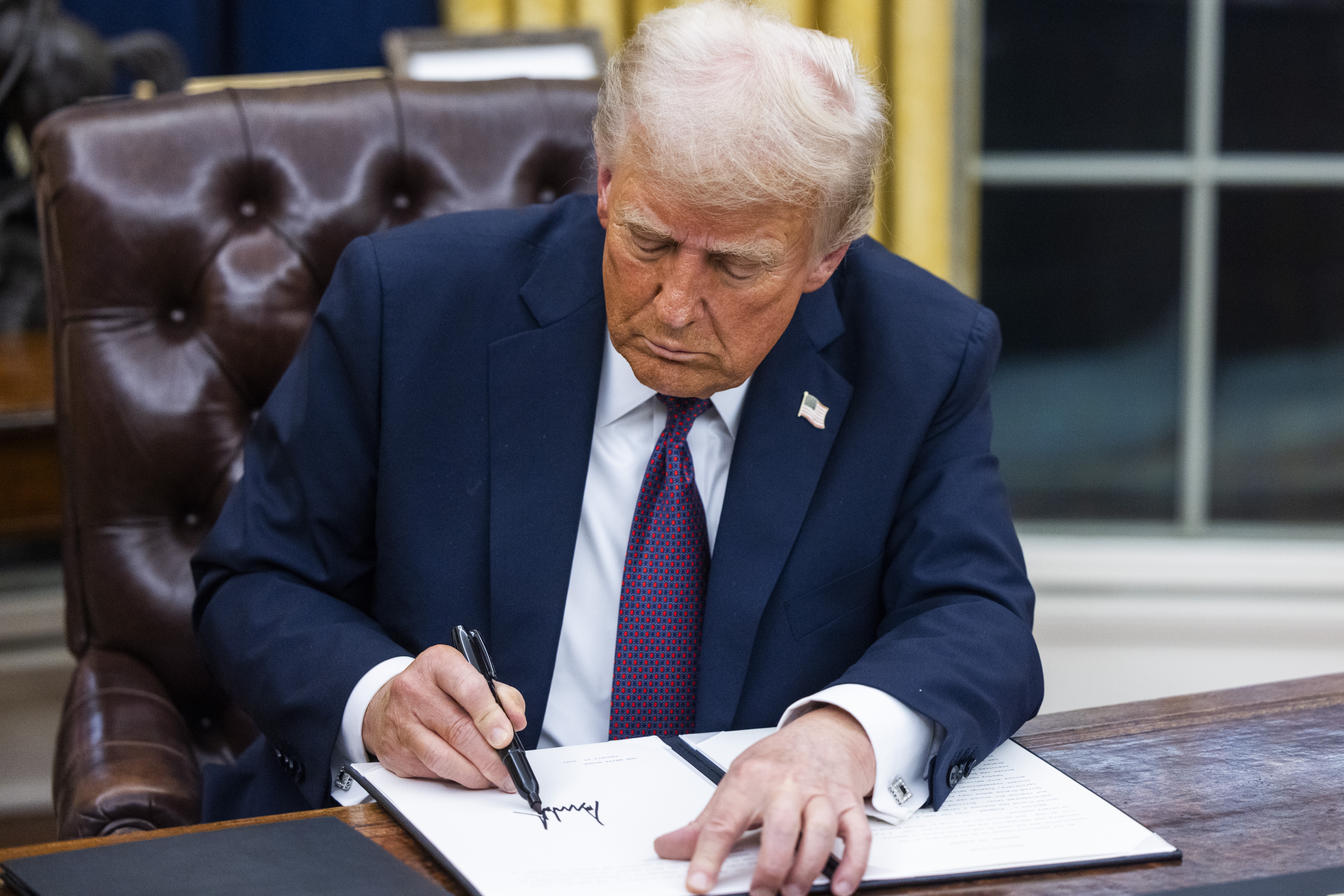 Trump orders federal workers back to office full-time