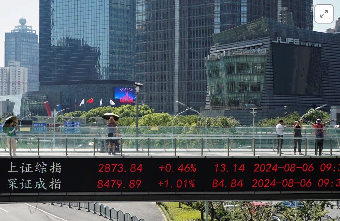 Asian shares creep higher, dollar languishes before ECB