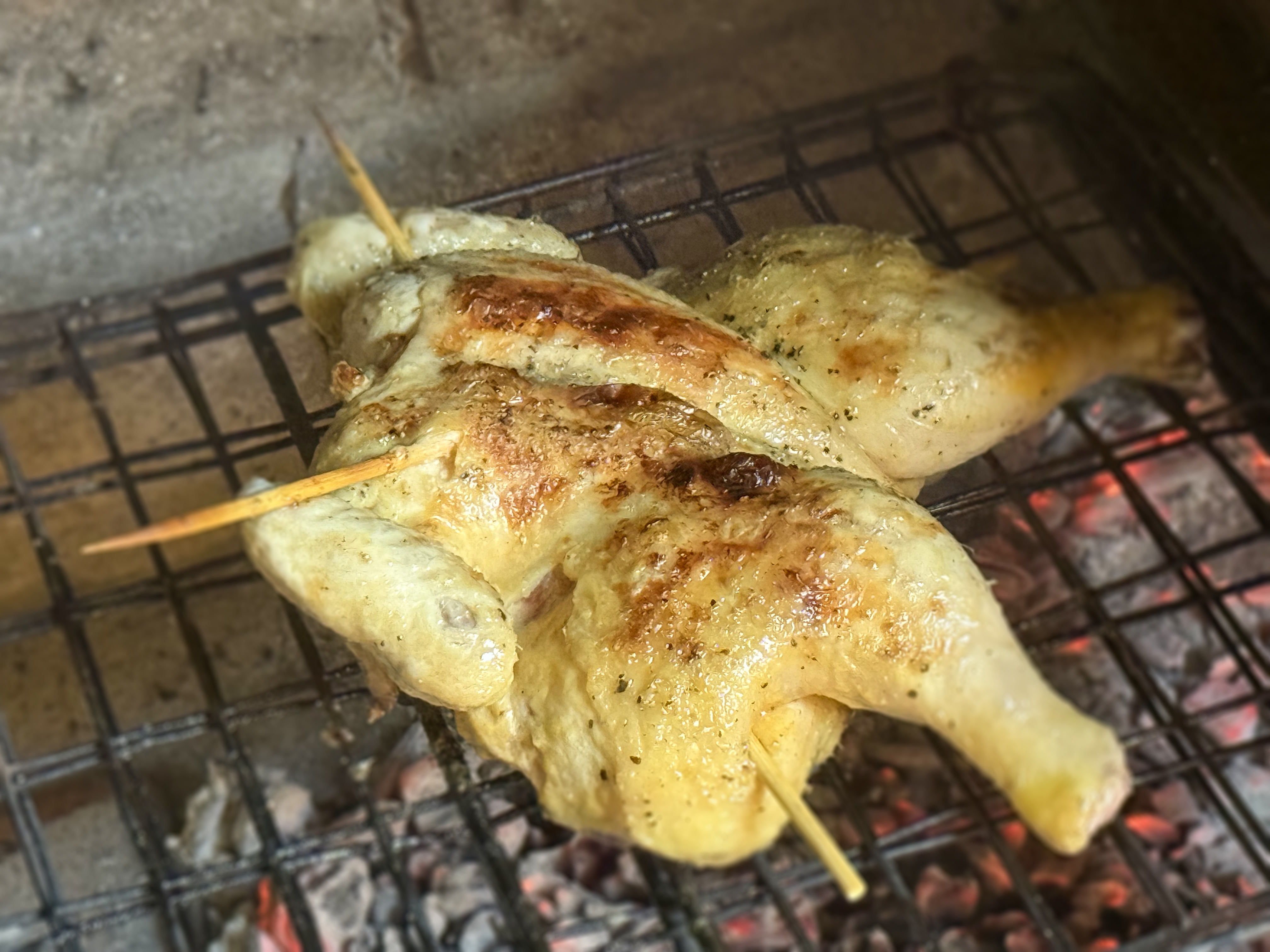 Cardamom butter works its magic on a braaied spatchcock chicken