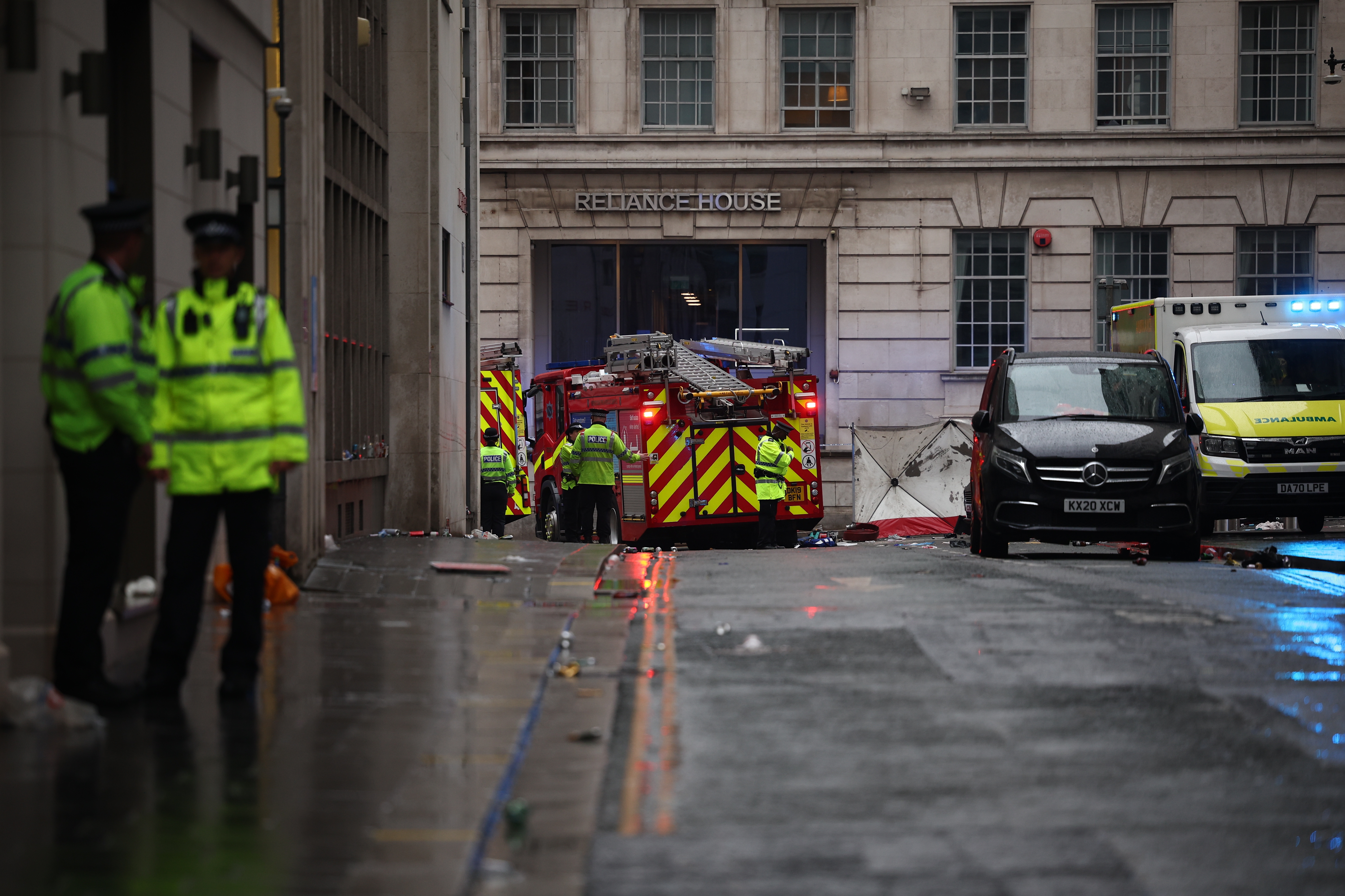 Man detained after car hit crowds at Liverpool's title parade