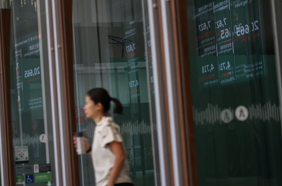 Stocks slip, dollar sags as Trump tariffs remain after latest courtroom twist