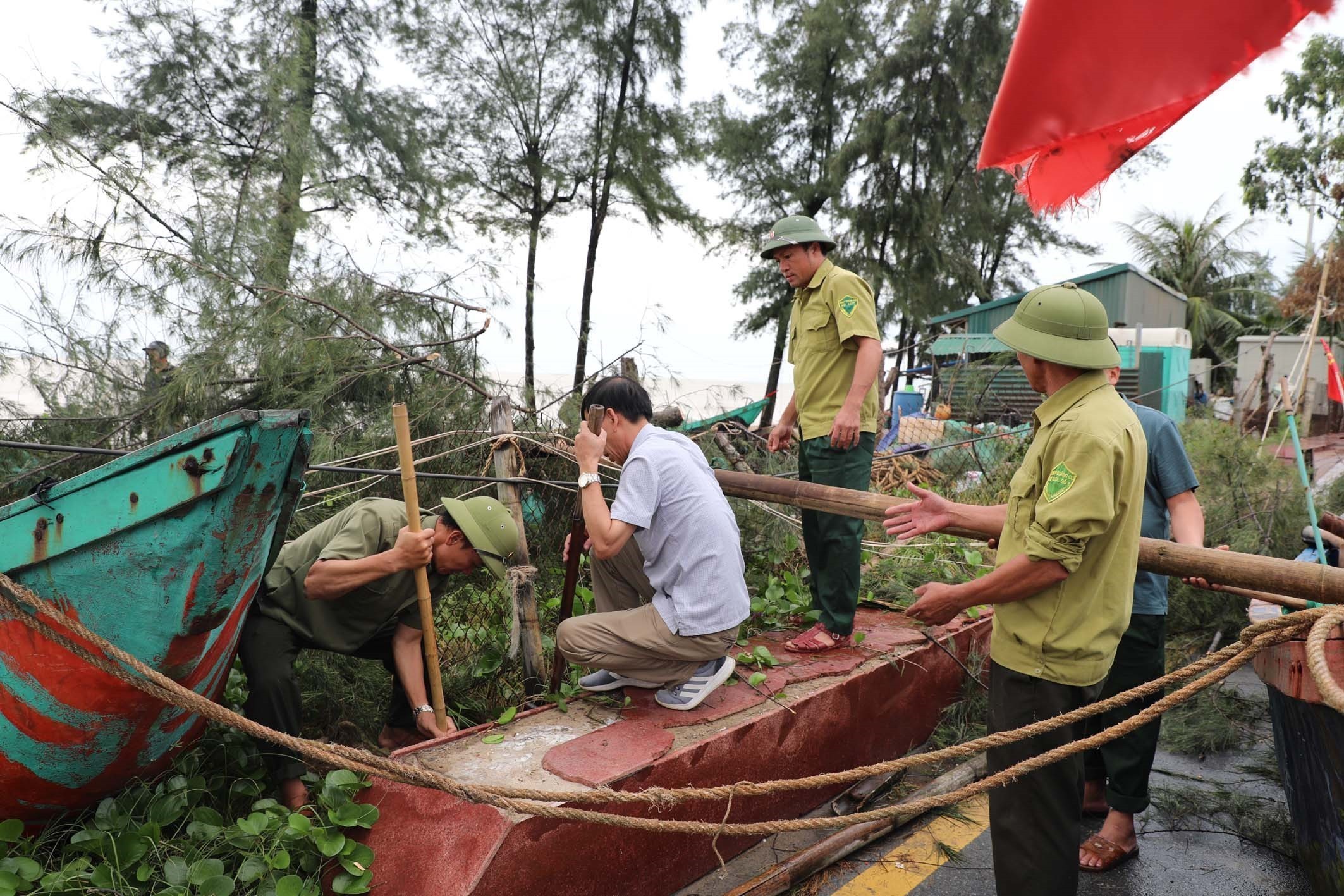 Trees down, homes flooded as Typhoon Kajiki batters Vietnam