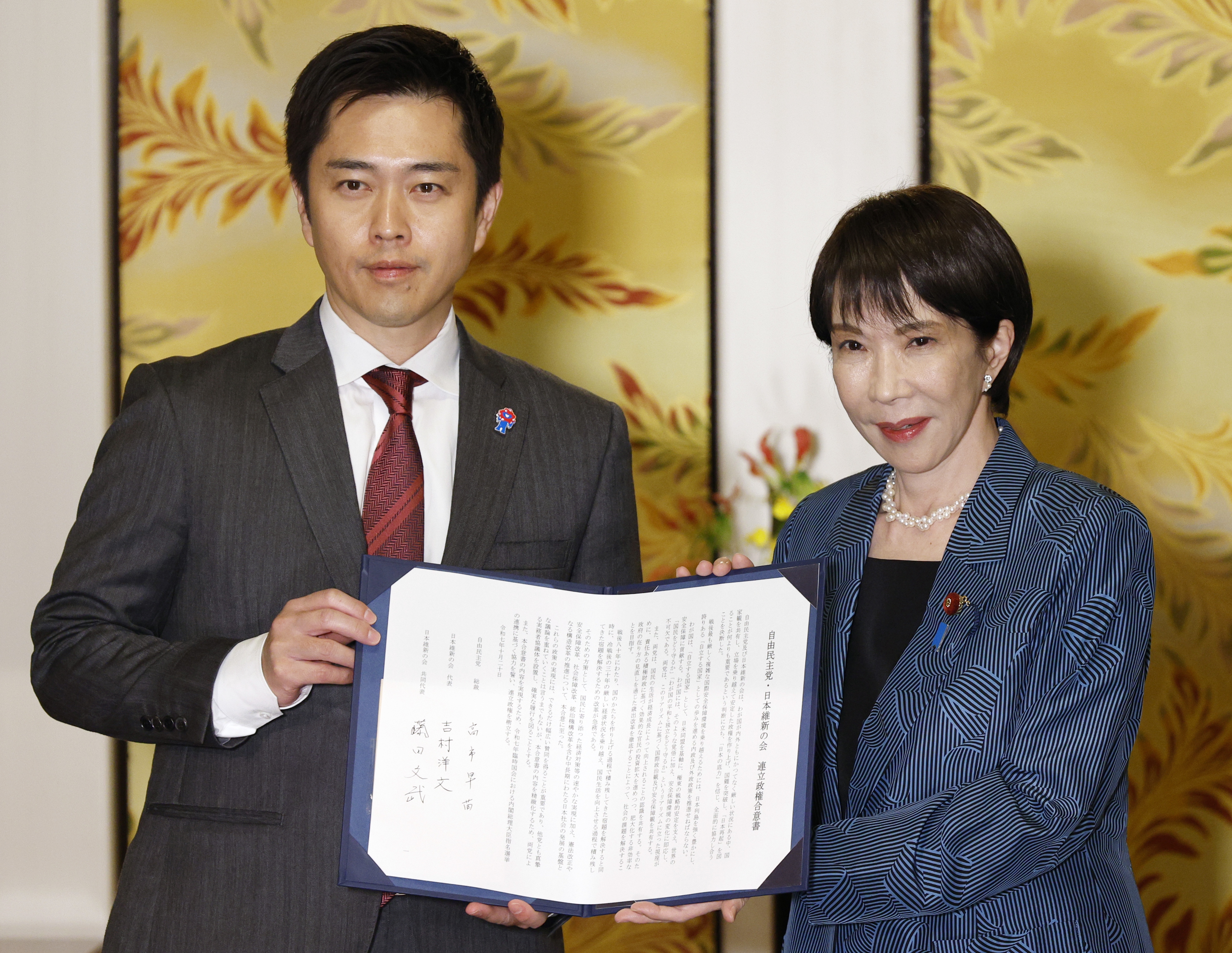 Japan's ruling Liberal Democratic Party sign a coalition agreement with Japan Innovation Party