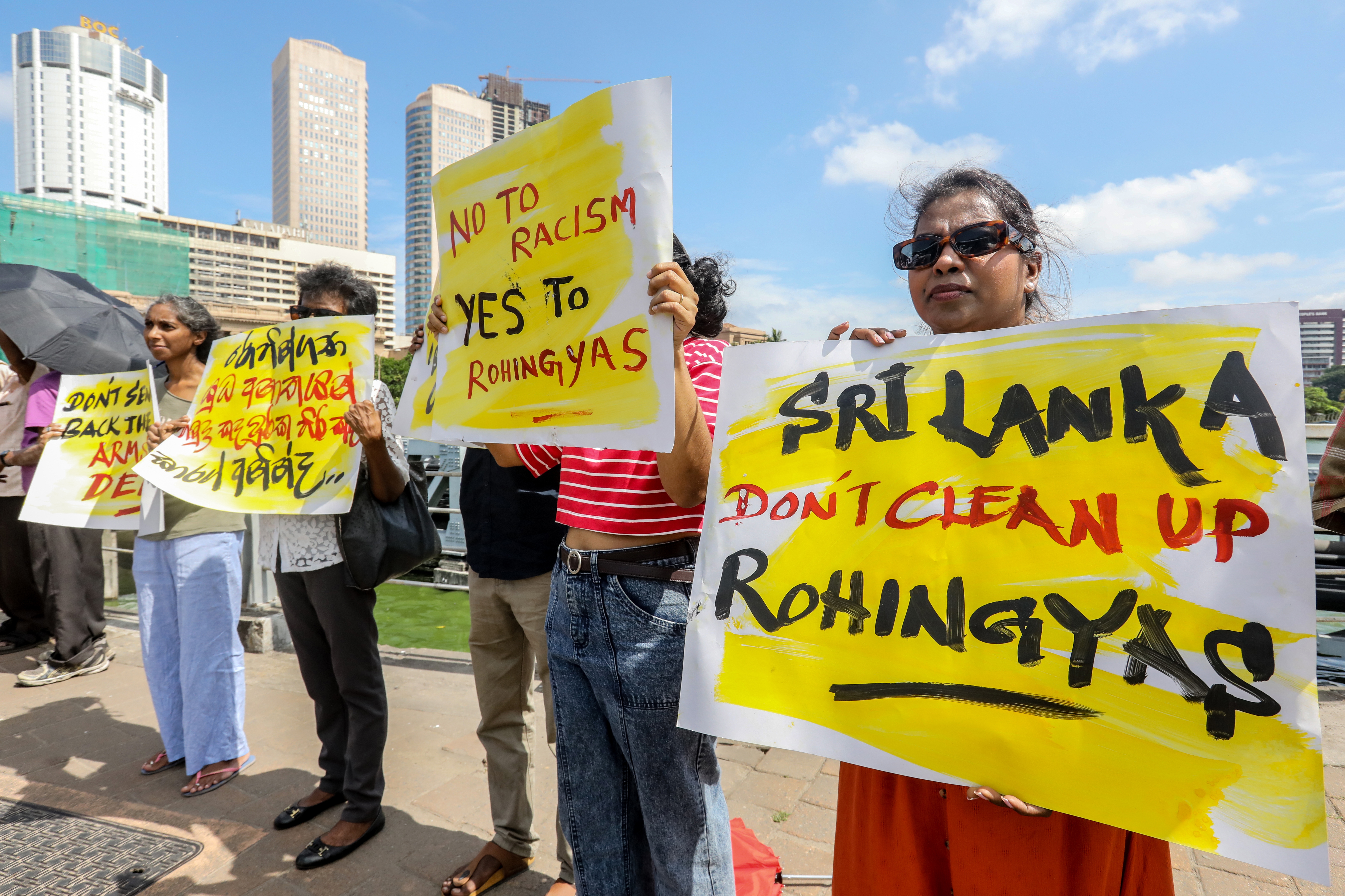 Malaysia steps up search for missing Rohingya boats, at least 11 dead