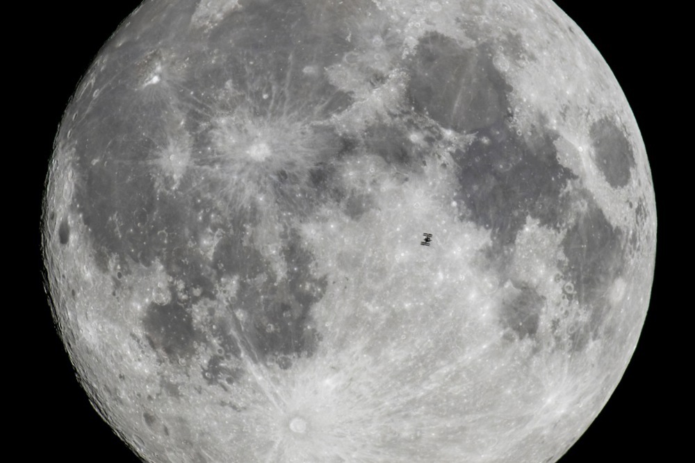 International Space Station captured in the foreground of the Moon, and more around the world