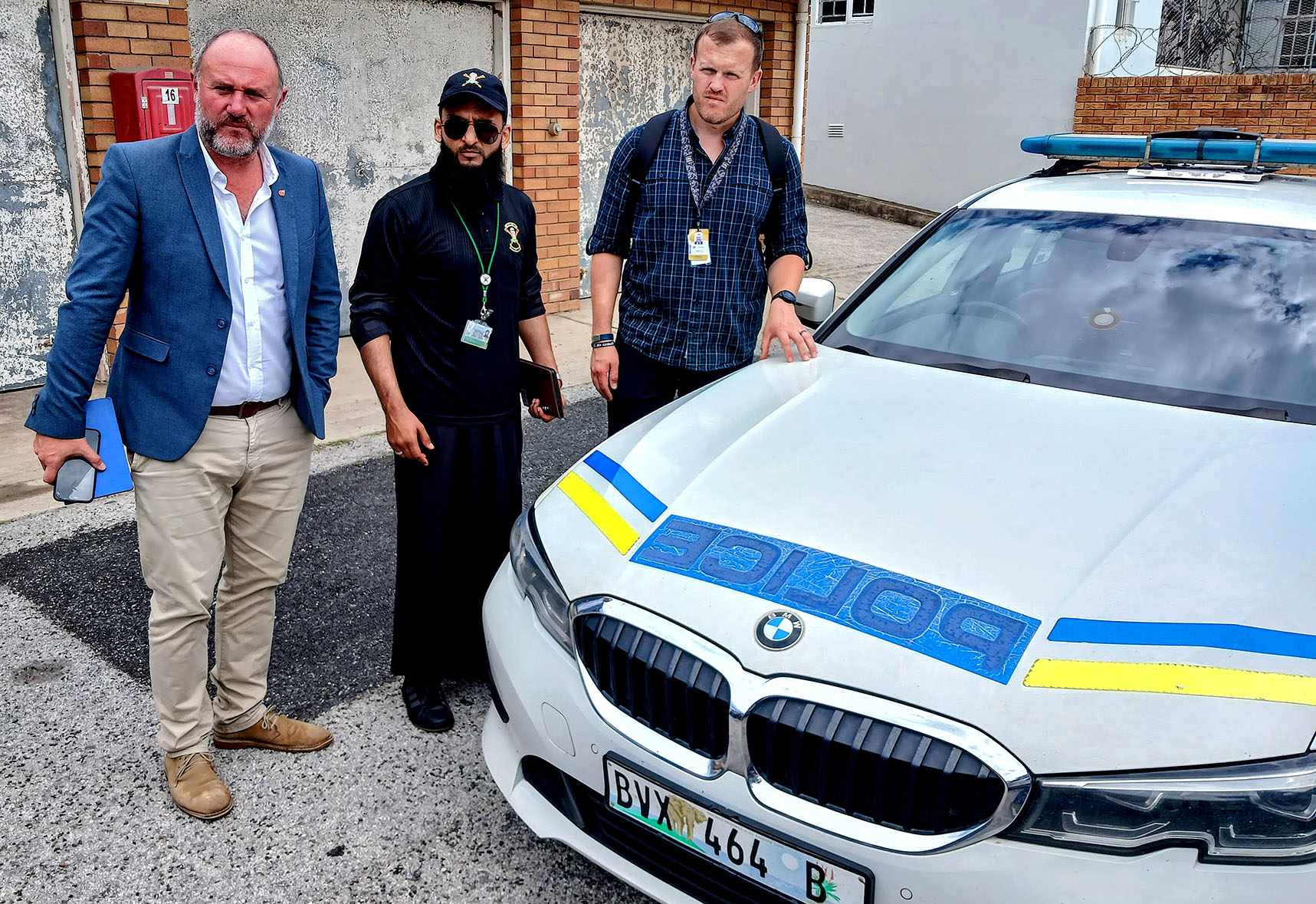 DA mayoral candidate Retief Odendaal (left) and DA MP Yusuf Cassim (centre) accompanied DA MP Ian Cameron (right) on his visit to Nelson Mandela Bay’s Flying Squad. The pictured patrol car, one of the unit’s high-performance vehicles, came back from repairs and broke down the following day. (Photo: Riaan Marais)