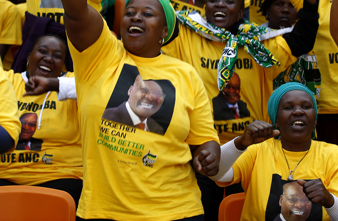 Supporters of the ruling party African National Congress (ANC) chant slogans during their final rally in Soweto