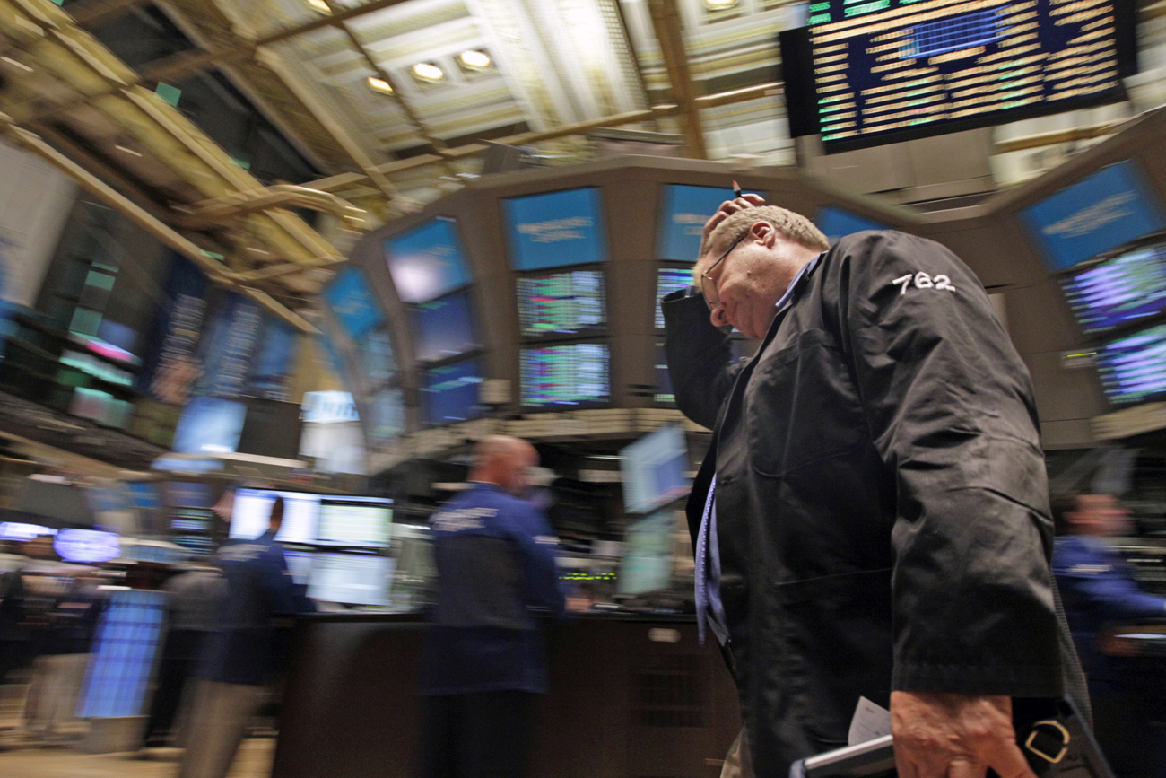 Traders work on the floor of the New York Stock Exchange