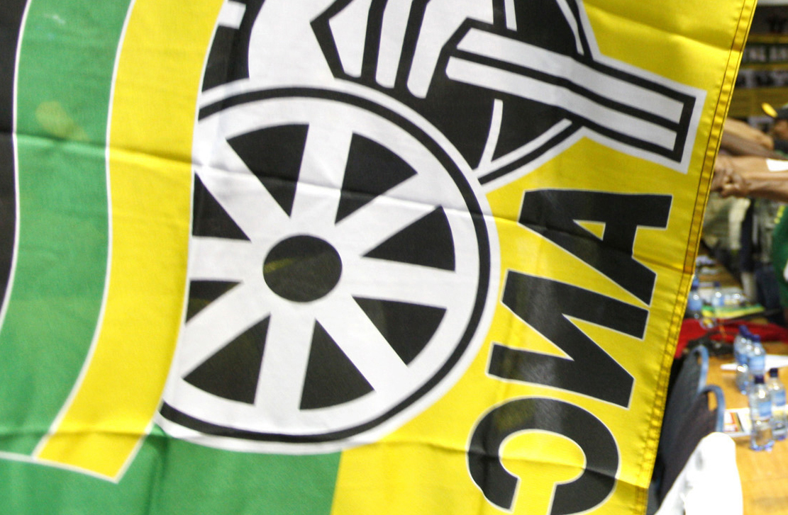 Supporters cheer as President Jacob Zuma delivers the closing address at the National General Council of his ruling African National Congress